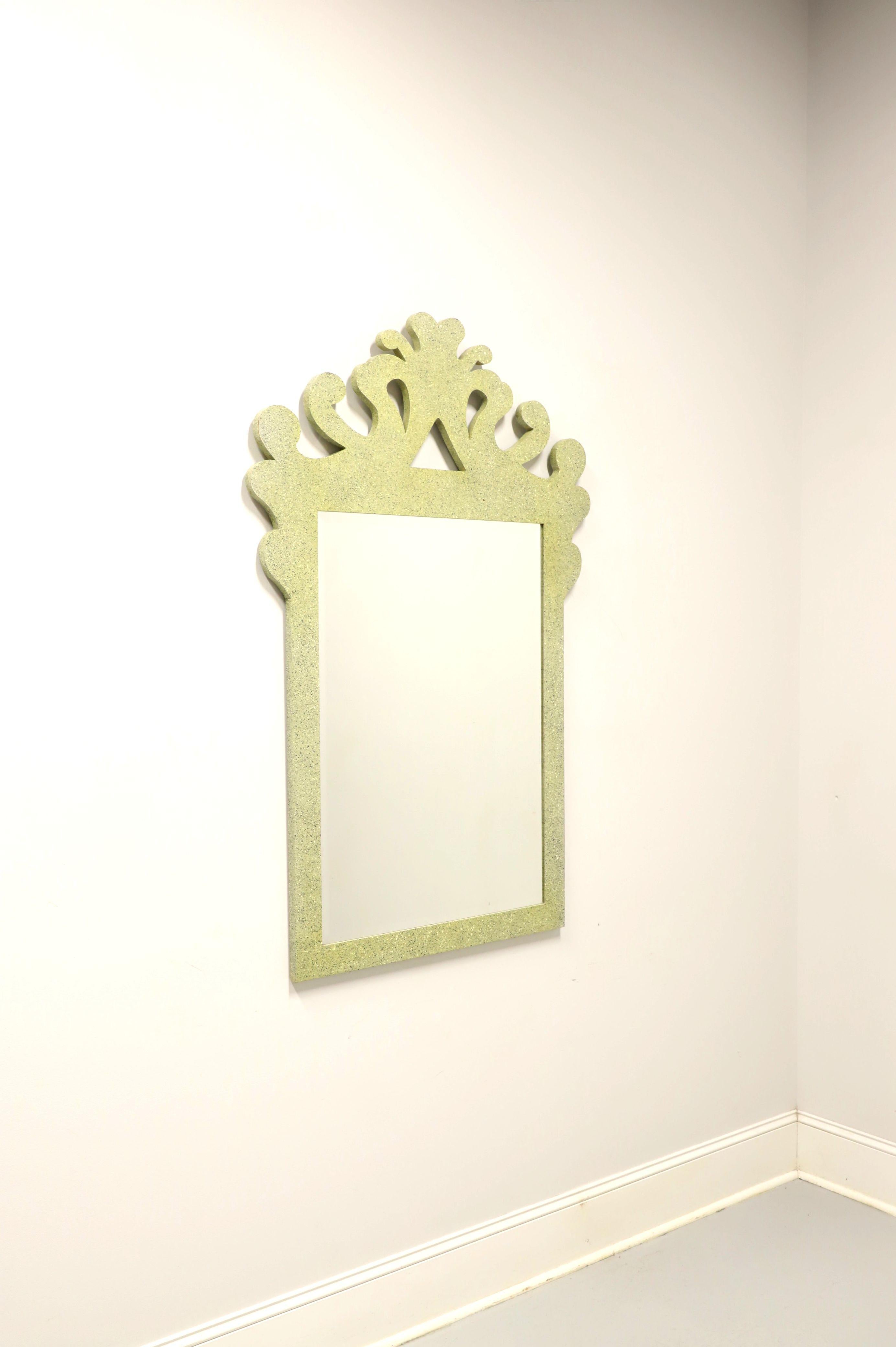 An Art Deco style wall mirror, unbranded. Beveled mirror glass in a wood frame with decorative carving to the top and painted a light green speckled color. Made in Italy, in the mid 20th Century.

Measures: 36.75w 1d 55.25h, Weighs Approximately: 30