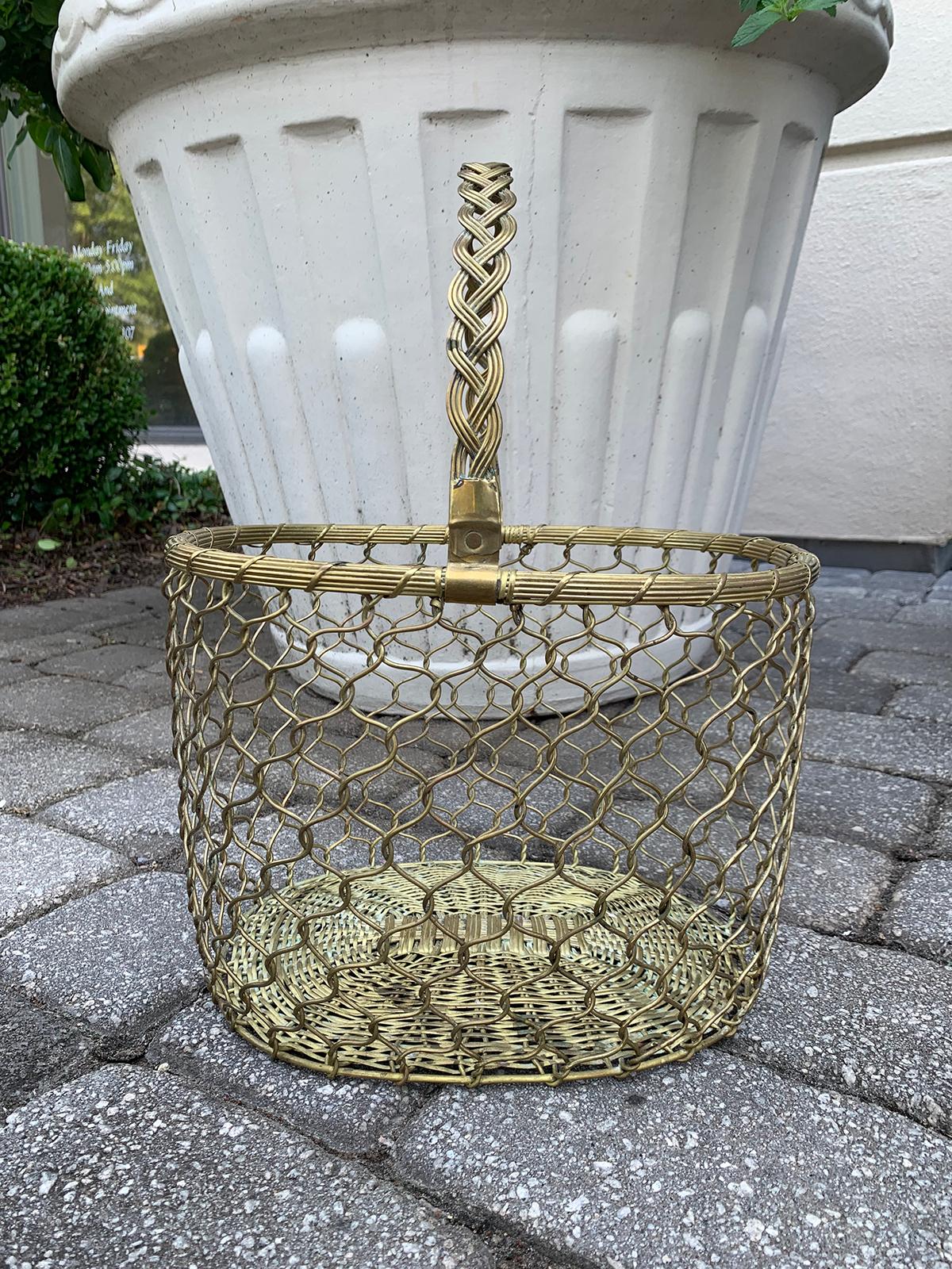 Mid-20th century Italian brass wire basket with handle
Measures: 12