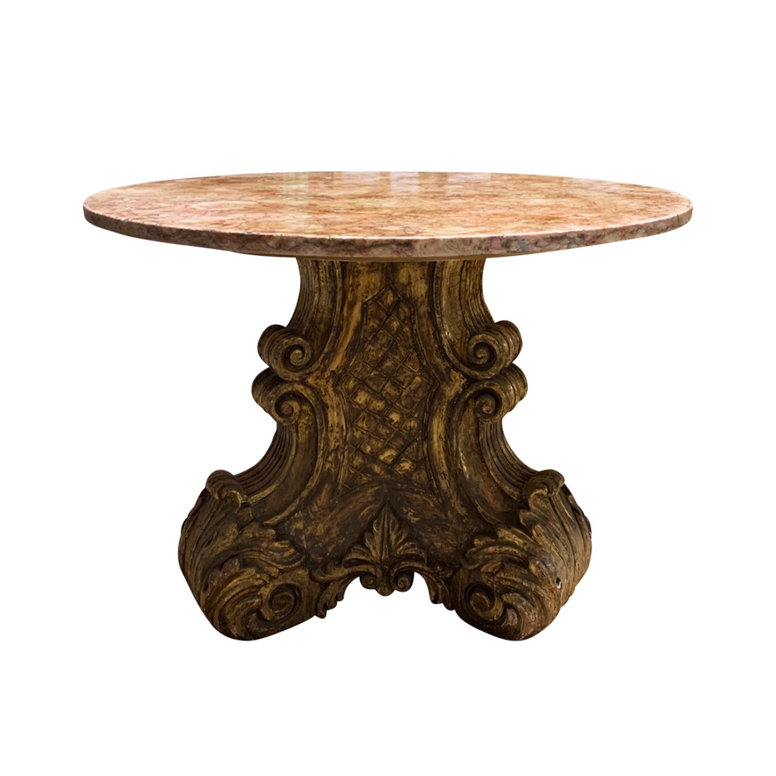 Mid-20th century Italian carved giltwood pedestal table with marble top.