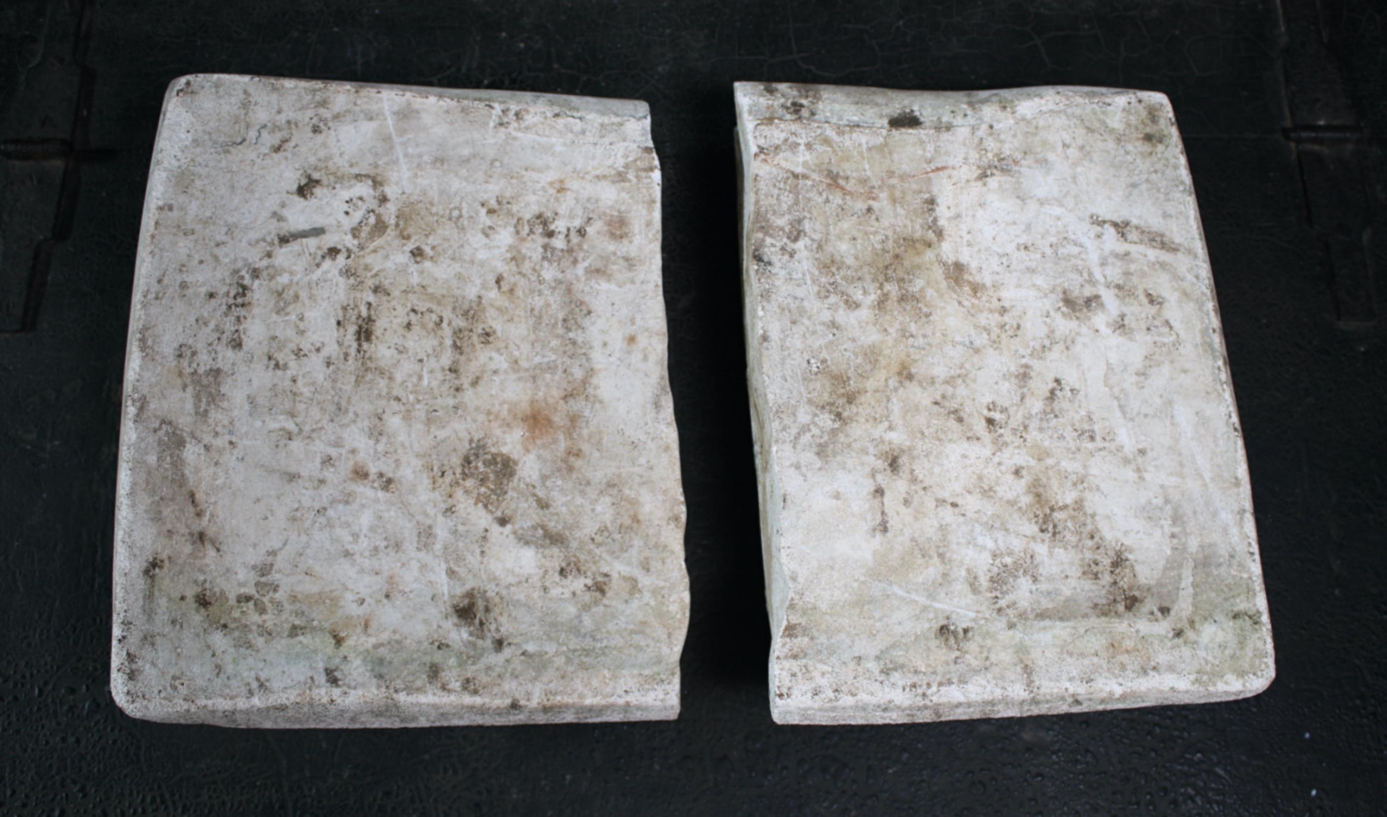 An unusual composite stone open book and hands, this would off likely been a grave marker or part of a larger more elaborate memorial.

Mid-20th century in age, well weathered. The piece is in two sections when complete the piece measurements are