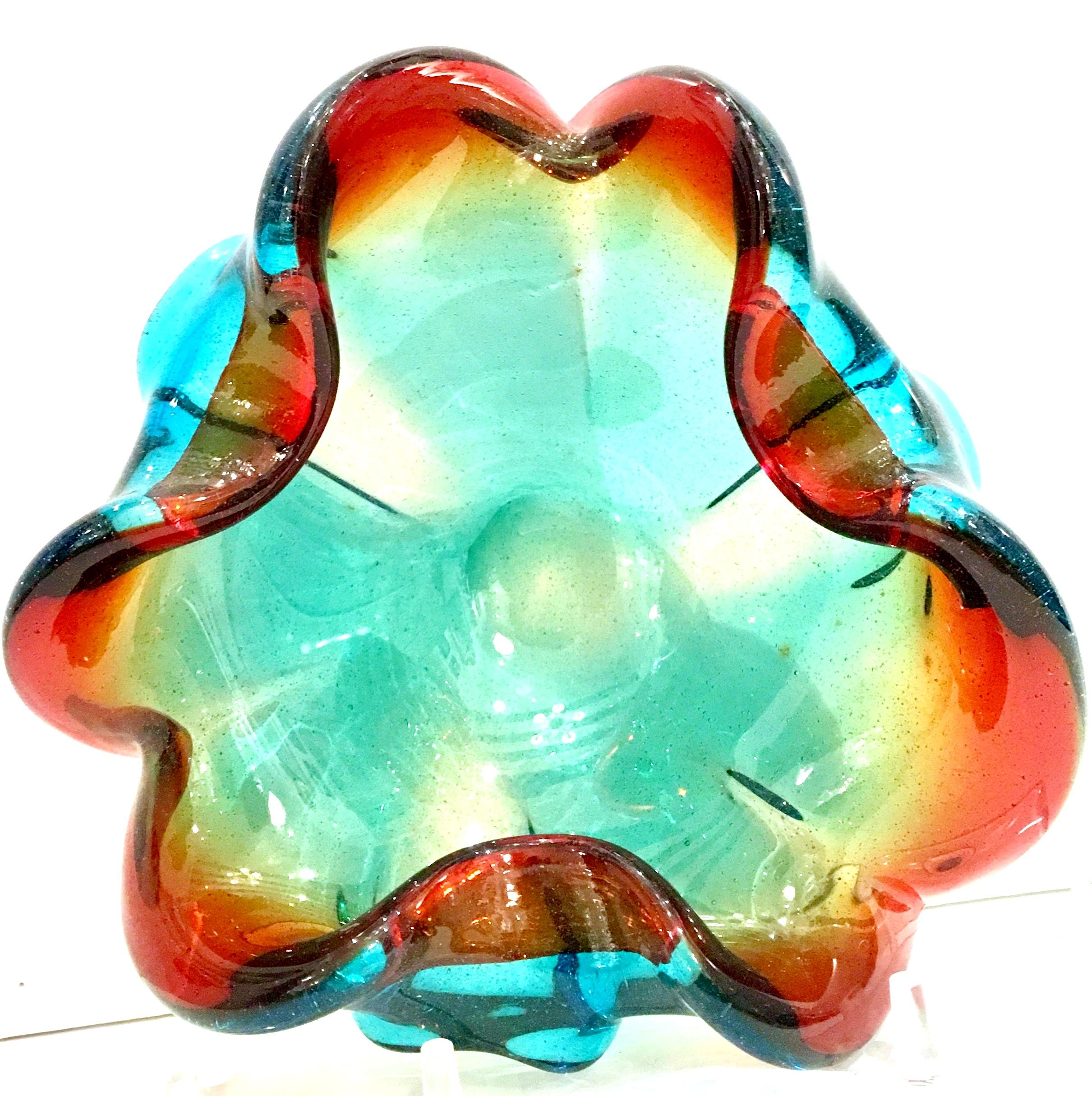 Mid-20th century Italian Murano glass tri-color large flower bowl. Features inclusion bubble detail with a vibrant turquoise to amber 