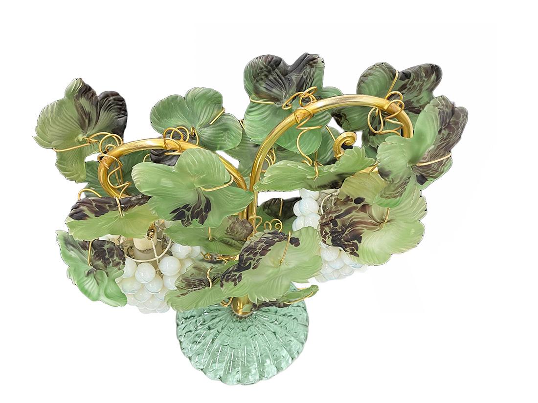 Mid-20th century Italian Murano grape lamp

A beautiful Italian Murano grape table lamp from the mid-20th century with hand blown leaves. Cesare Toso is well known with these lamps. The grape lamp with 2 bunches of grapes on each side are
