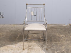 Sillón italiano de mediados del siglo XX de acero pulido con detalles de latón
