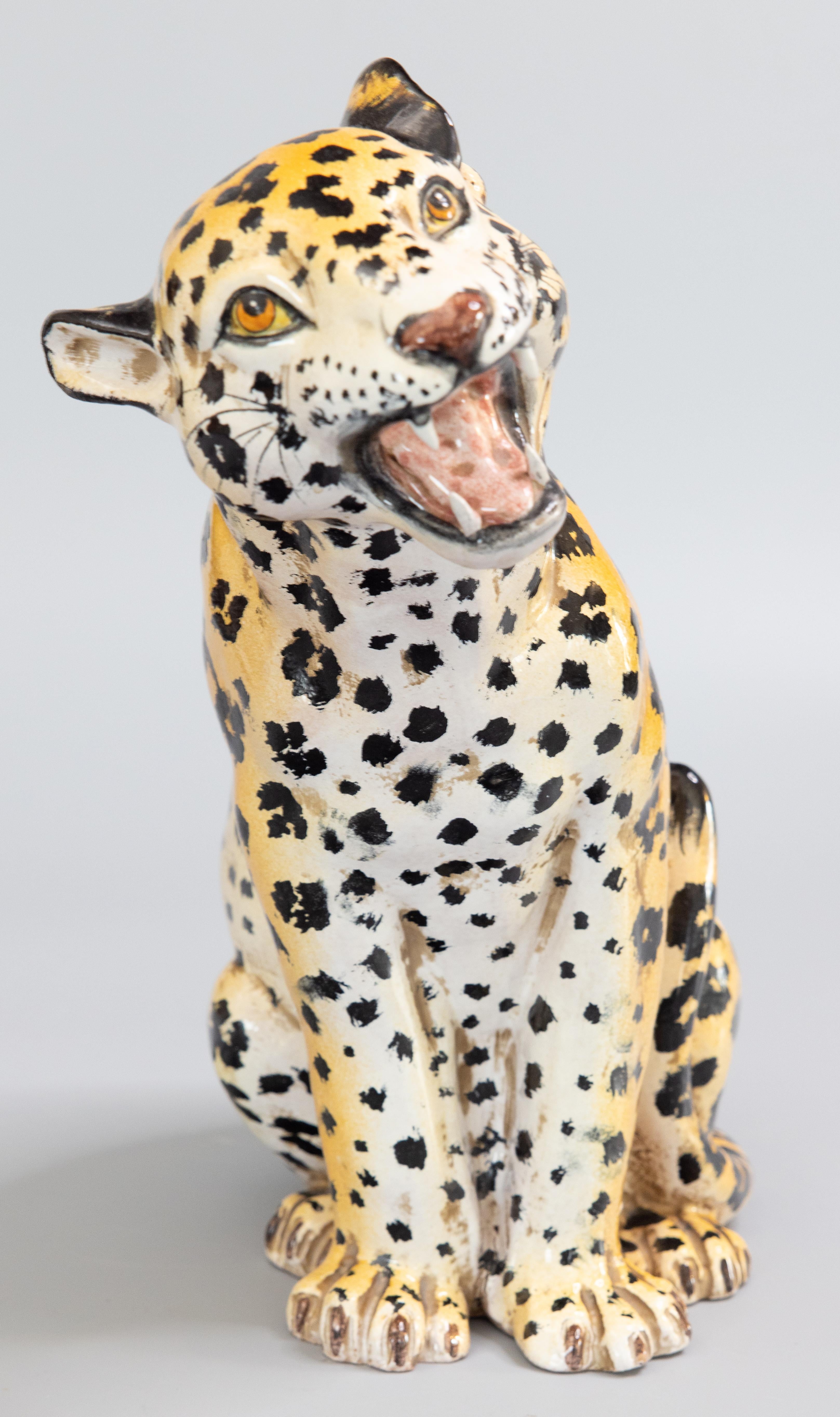 A stylish vintage Mid-20th century Italian ceramic glazed terra cotta growling leopard sculpture. Signed 