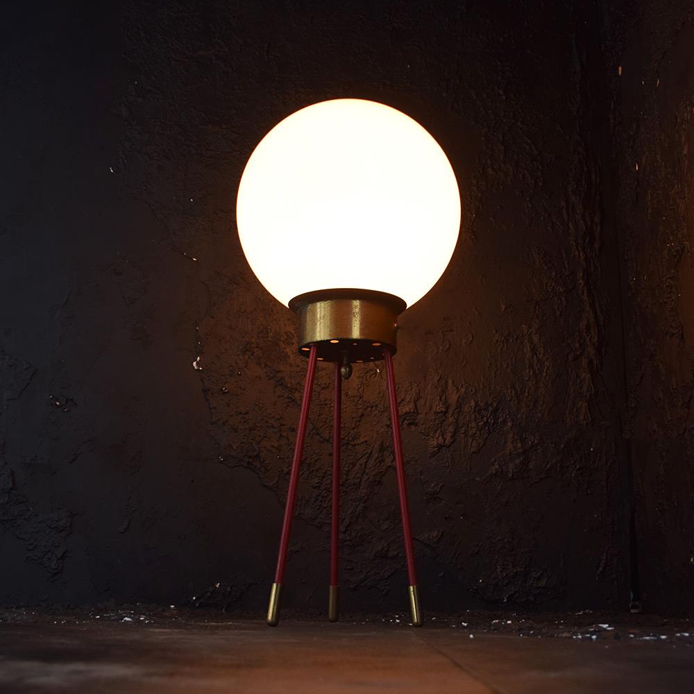 Mid-20th Century Italian Tripod brass and milk shade lamp

We are proud to offer a Mid-20th Century Italian tripod brass and milk shade lamp. Made from brass and metal, with a circular glass milk shade sat on top 
(Which is removable). Rewired to