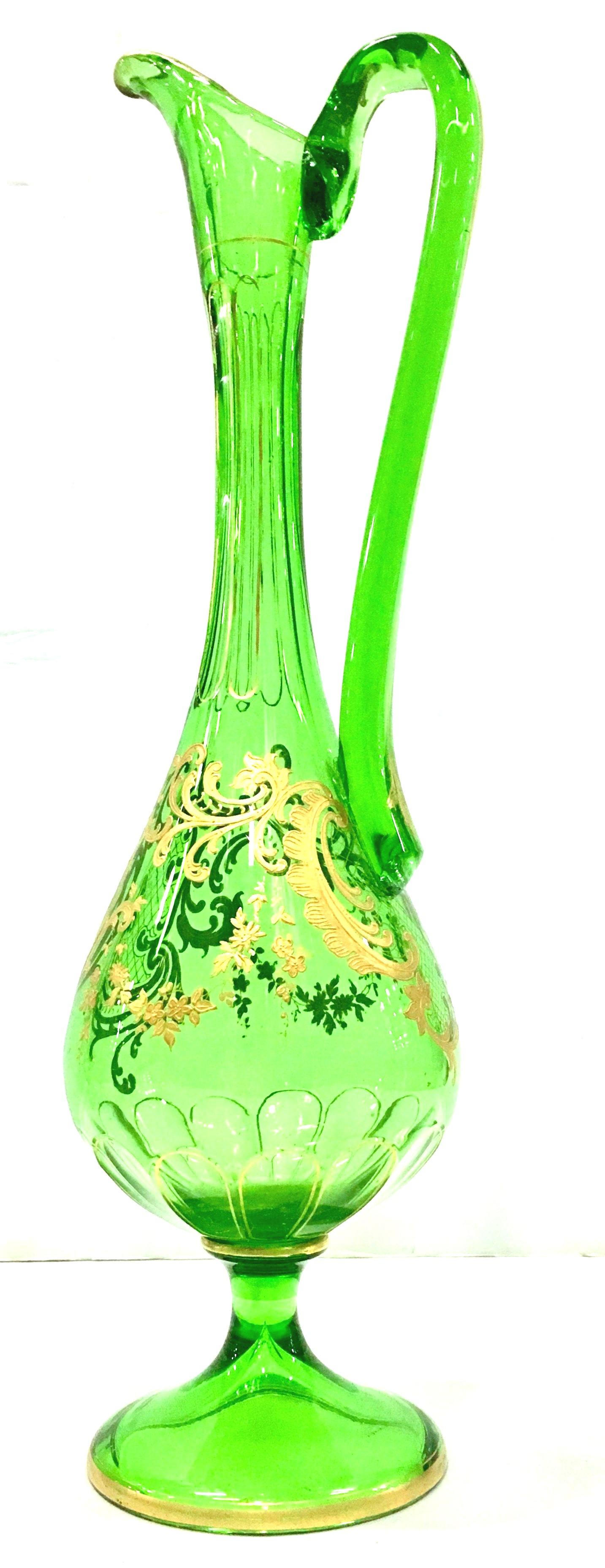 Midcentury Italian Venetian chartreuse green optic blown glass and raised 22-karat gold hand painted six-piece drinks set. This six-piece set includes one applied handle and spouted footed pitcher and five cordial brandy glasses. Each piece features