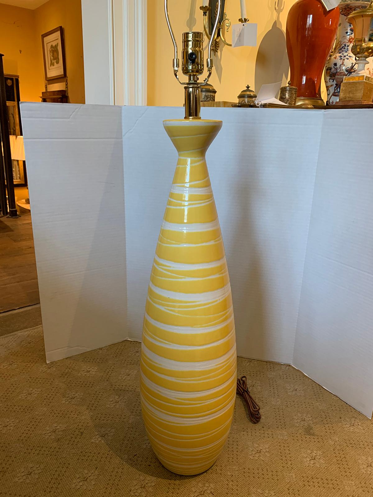 Mid-20th century Italian yellow and white swirl glazed pottery lamp
new wiring.