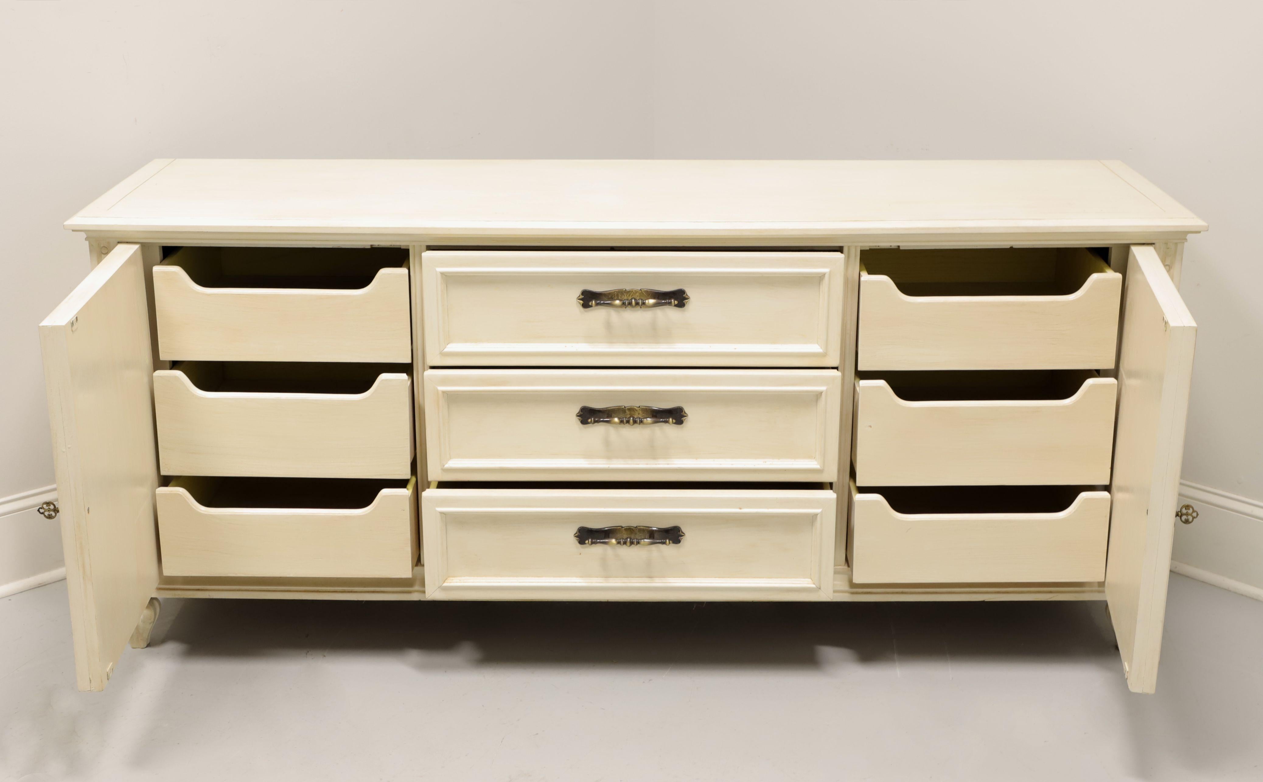 American Mid 20th Century Ivory Painted Slightly Distressed Spanish Style Triple Dresser