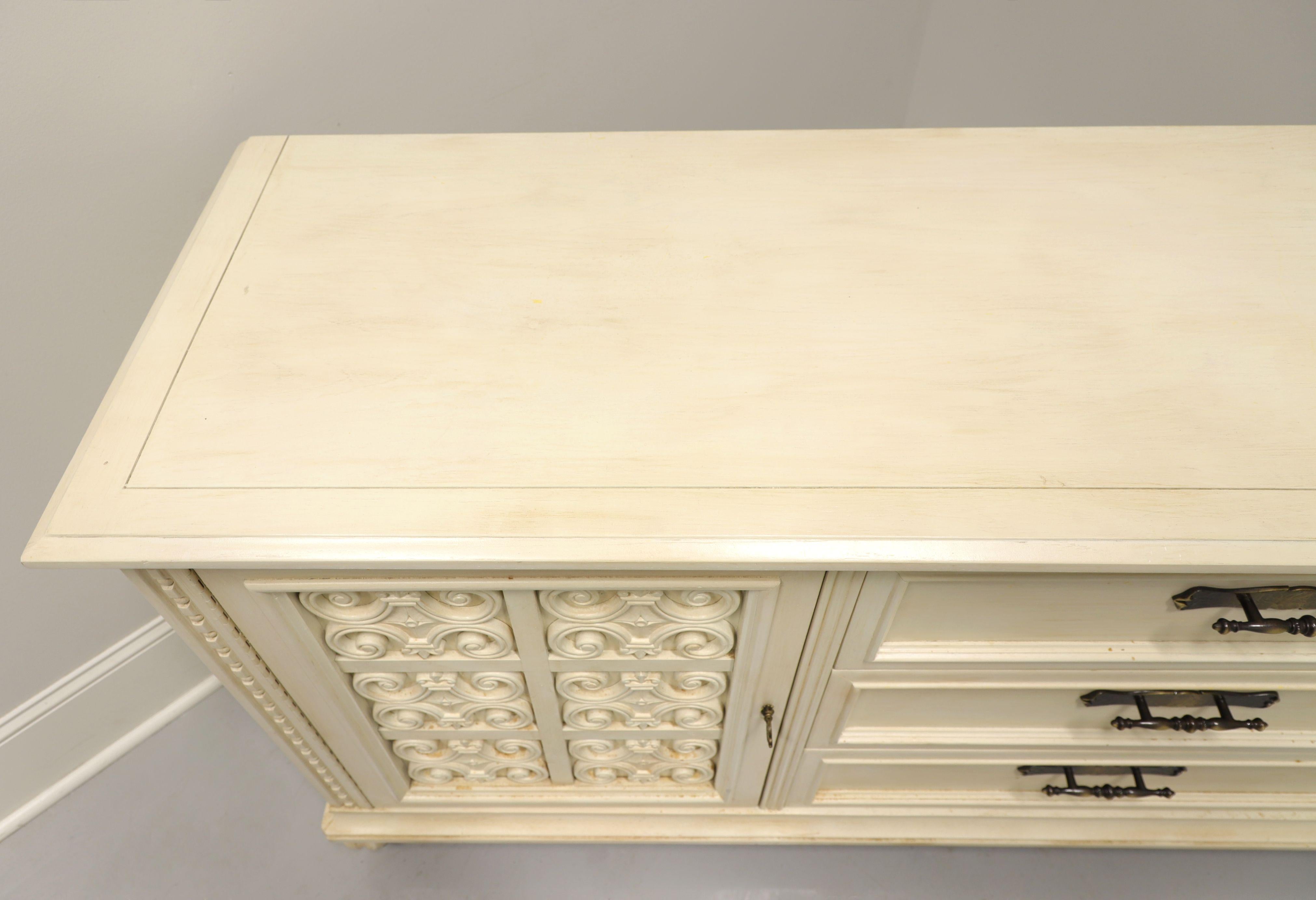 Mid 20th Century Ivory Painted Slightly Distressed Spanish Style Triple Dresser In Good Condition In Charlotte, NC