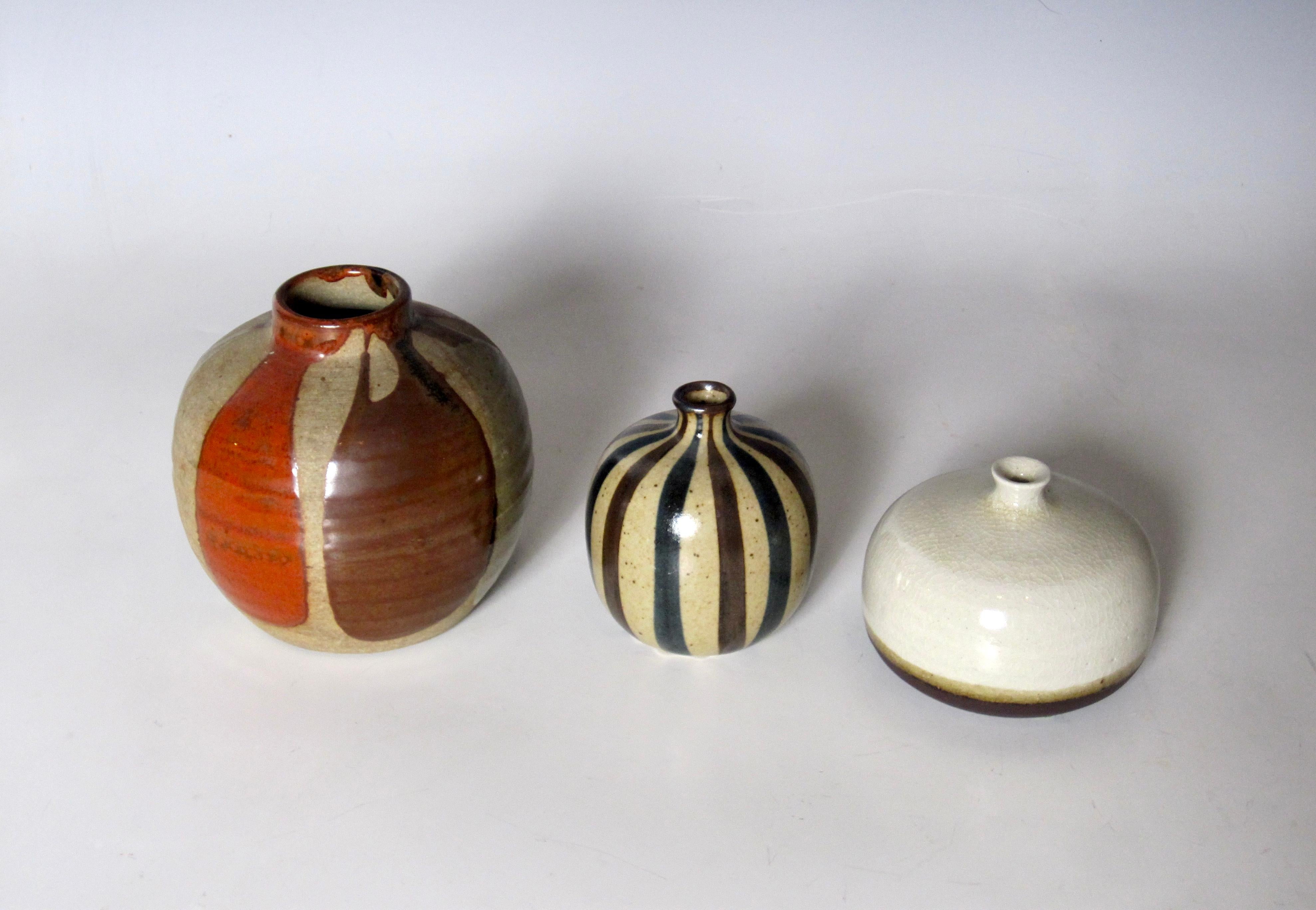 Three petite Japanese pots, two weeds pots and one lightly textured Toyo Japan stoneware bud vase pot. Cream weed pot (3.5