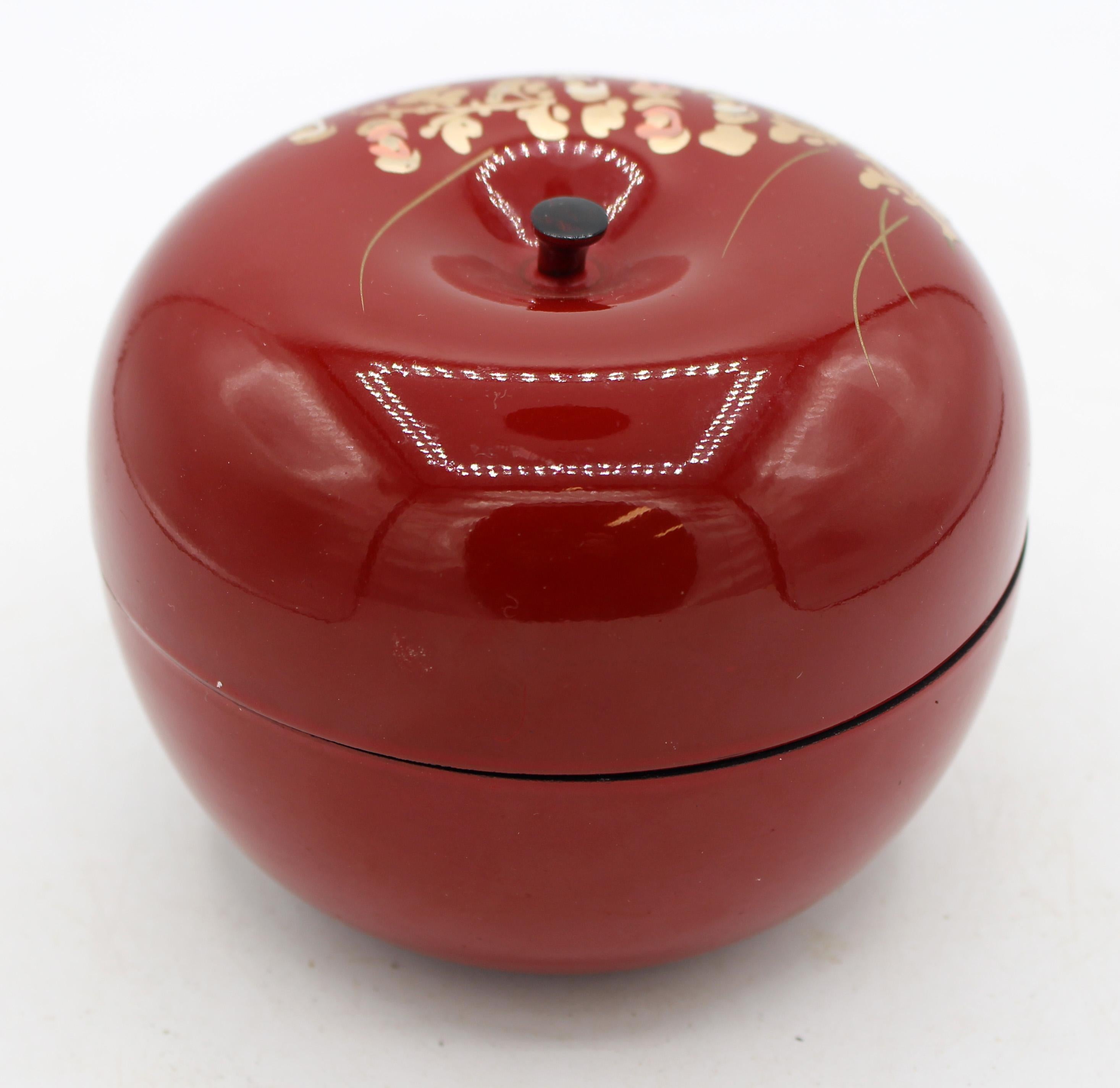 Mid-20th century Yamanaka lacquerware sweets box for tea ceremony, Japanese. Formed as a deep red apple with gold & colored enamel decoration. Post WWII. Provenance: Sherman E. Lee, Director, Cleveland Museum of Art & Asian specialist of world