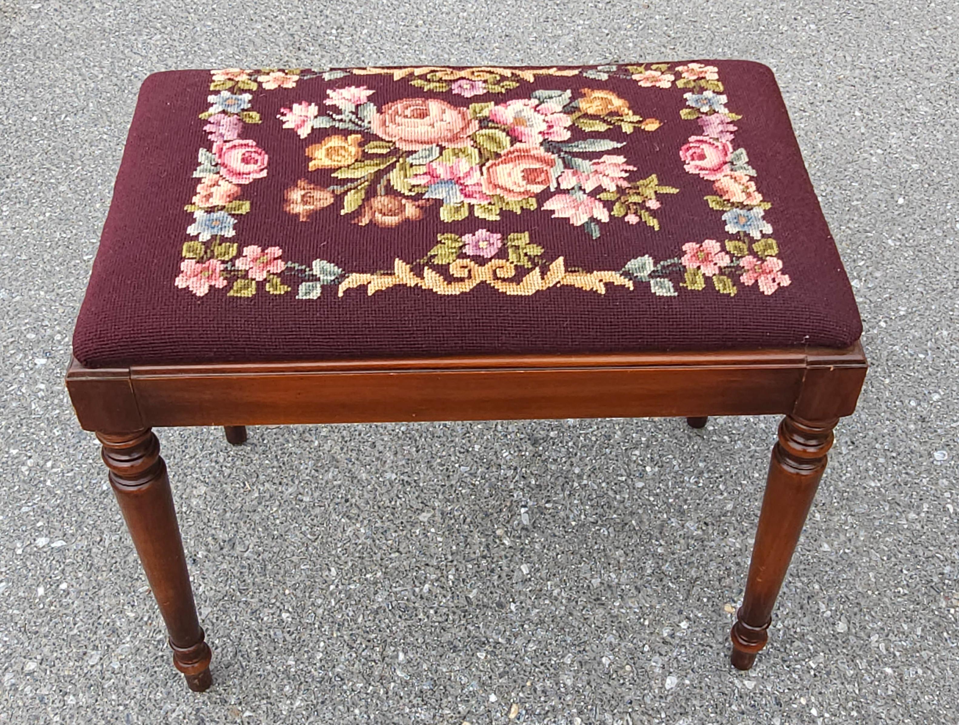 A Mid 20th Century Kindel Furniture solid Oxford Cherry and  Needlepoint Upholstered Bench with flower gallore.
Measures 24