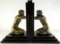 Kneeling Men's on Wood Bookends with Mirrors