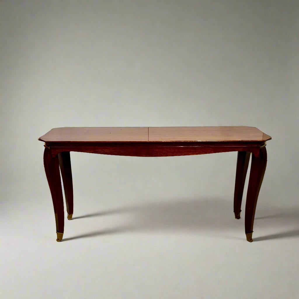 Large Art Deco Console designed by Maurice Rinck. Beautifully grained  wood with high gloss finish and patinated bronze details. France c1930's.