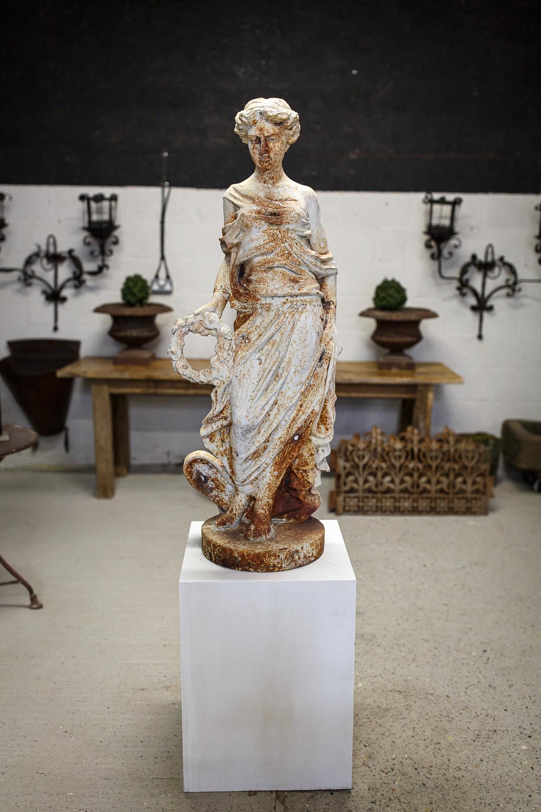 Large scale cast iron maiden statue, heavily weathered.
Dimensions: 48 cm x 122 cm x 37 cm.
  