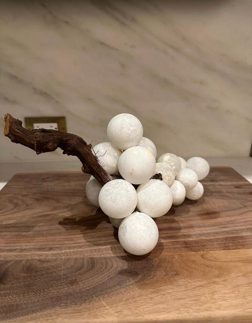 Large cluster of alabaster grapes with a wood stem. Great for styling in the kitchen, on a coffee table or shelves.