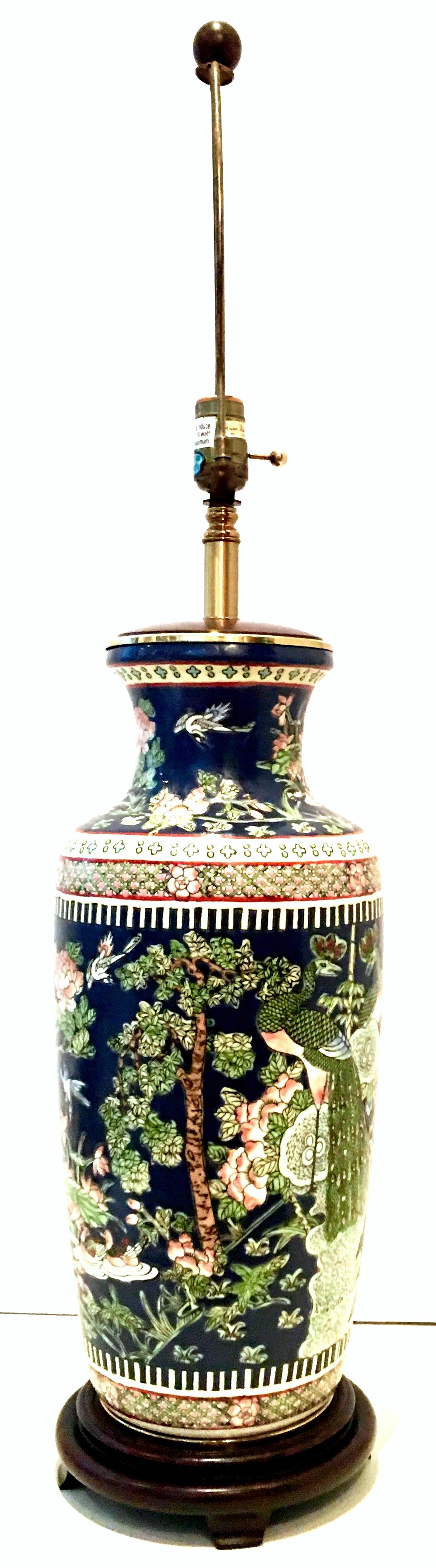 Chinese Mid-20th Century Large Famille Hand Painted Porcelain & Brass Wood Mounted Lamp For Sale