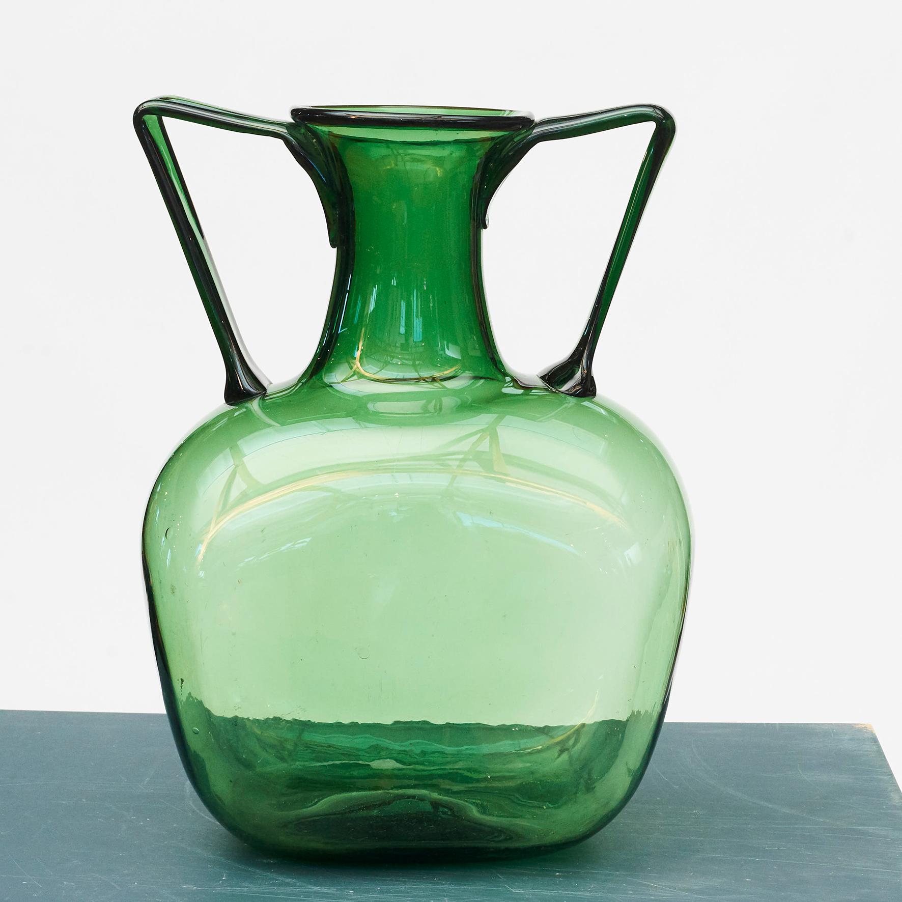 Large green hand blown glass vase, circa 1950, presumably from Italy.
Decorative. Perfect condition.