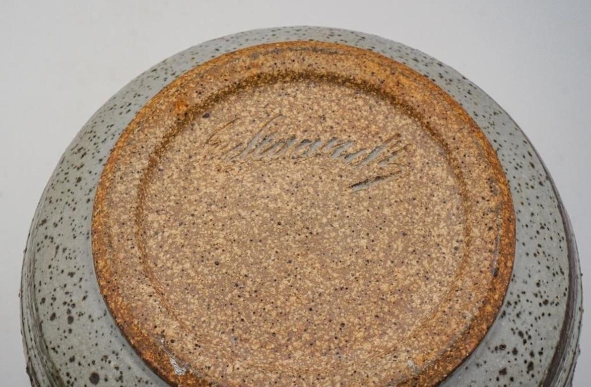 Vintage mid 20th century large lidded pottery jar by Joel Edwards (1923 - 2007) California.  Signed on bottom, speckled gray and brown satin glaze, speckled cream glazed interior.  Well known Californian potter he studied at the Brooklyn Museum