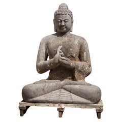 Gran estatua antigua de Buda de lavastone de mediados del siglo XX en el mudra Dharmachakra