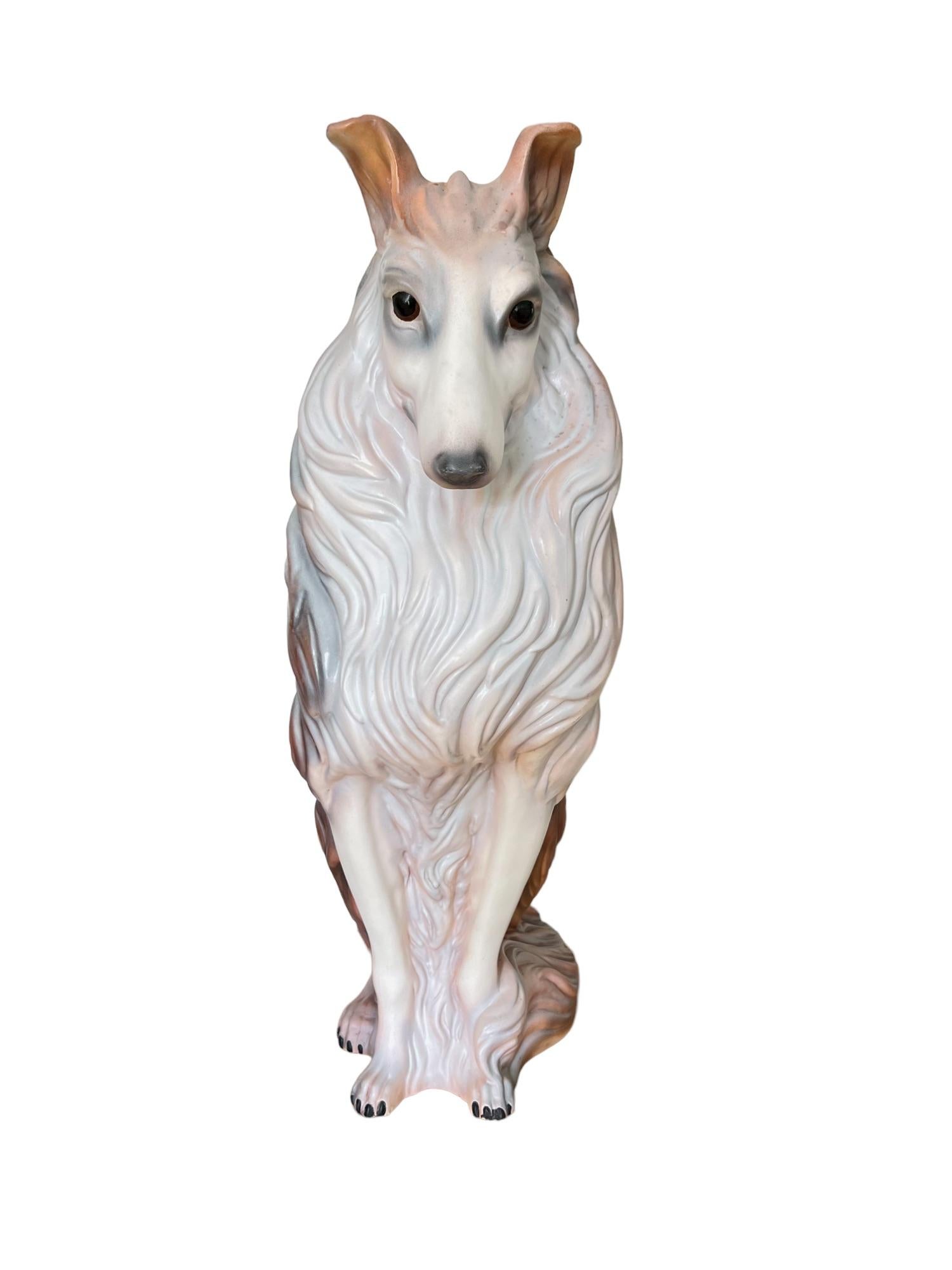 A vintage mid 20th century large scale glazed ceramic signed collie dog statue.

Dimensions: 12