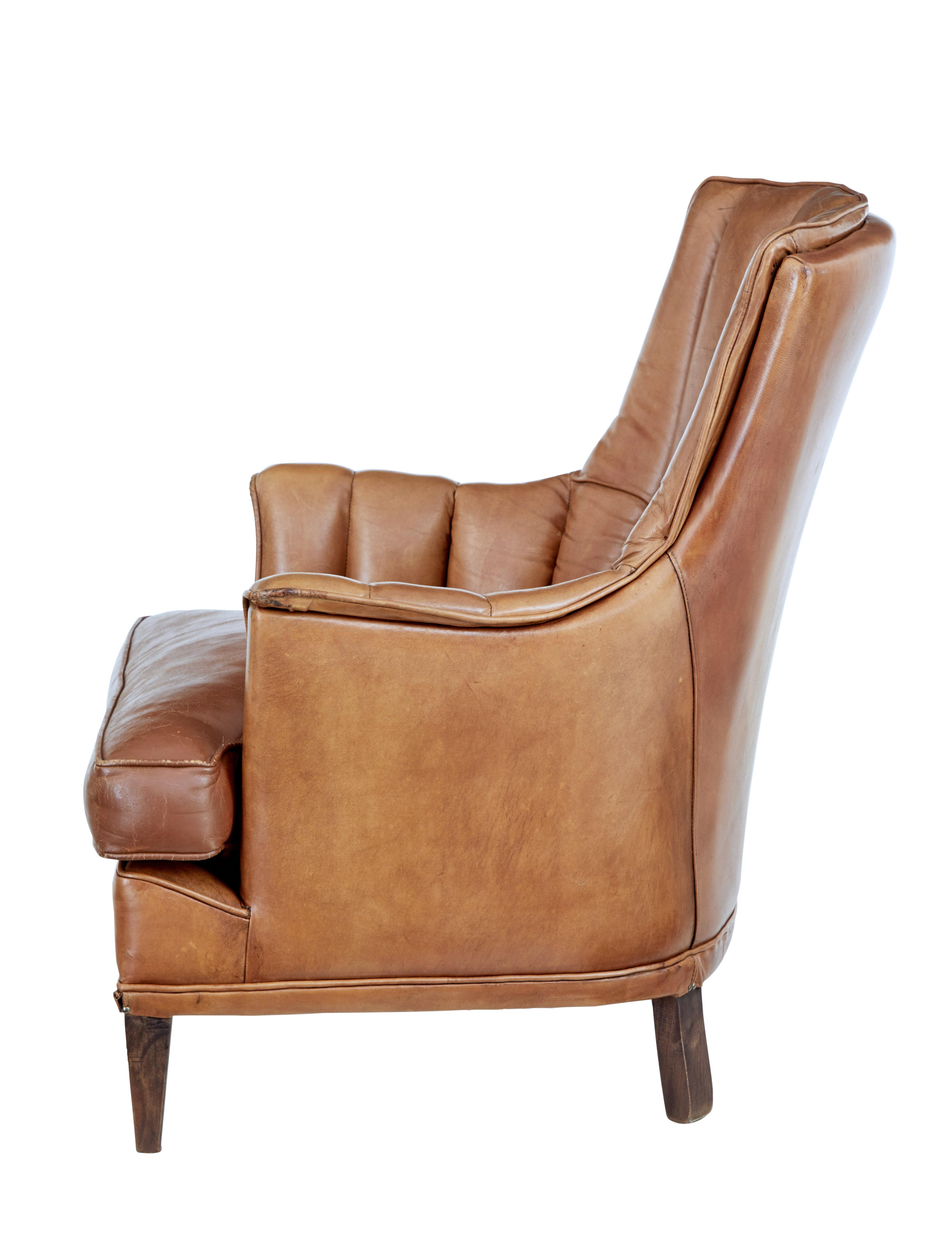 Hand-Crafted Mid 20th century leather shell back lounge chair