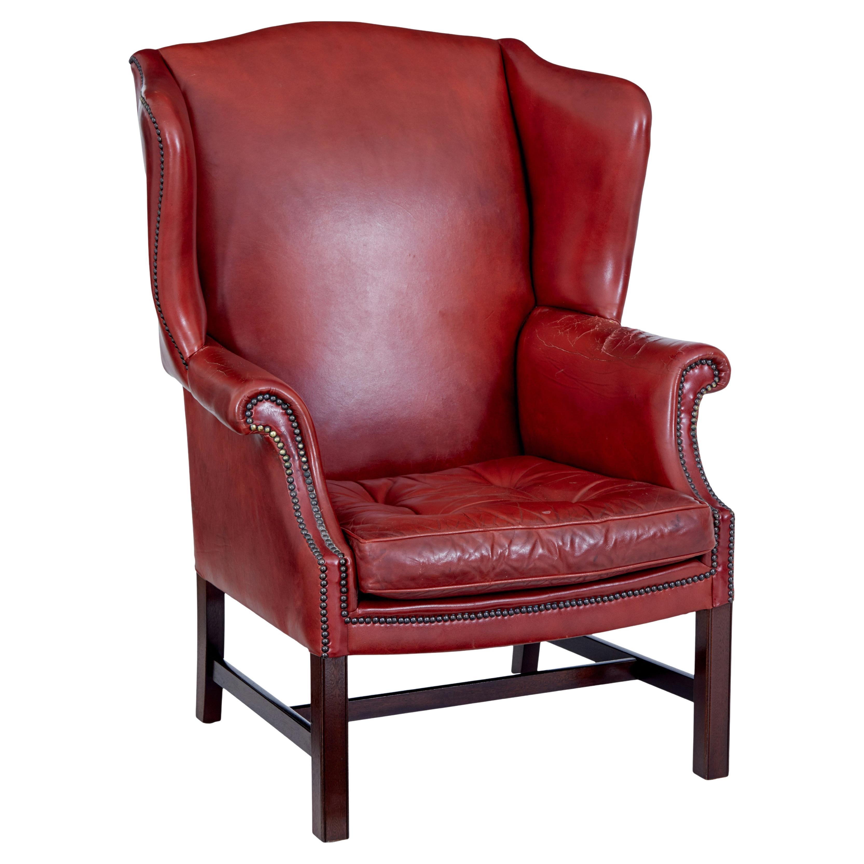 Mid 20th century leather wing back armchair