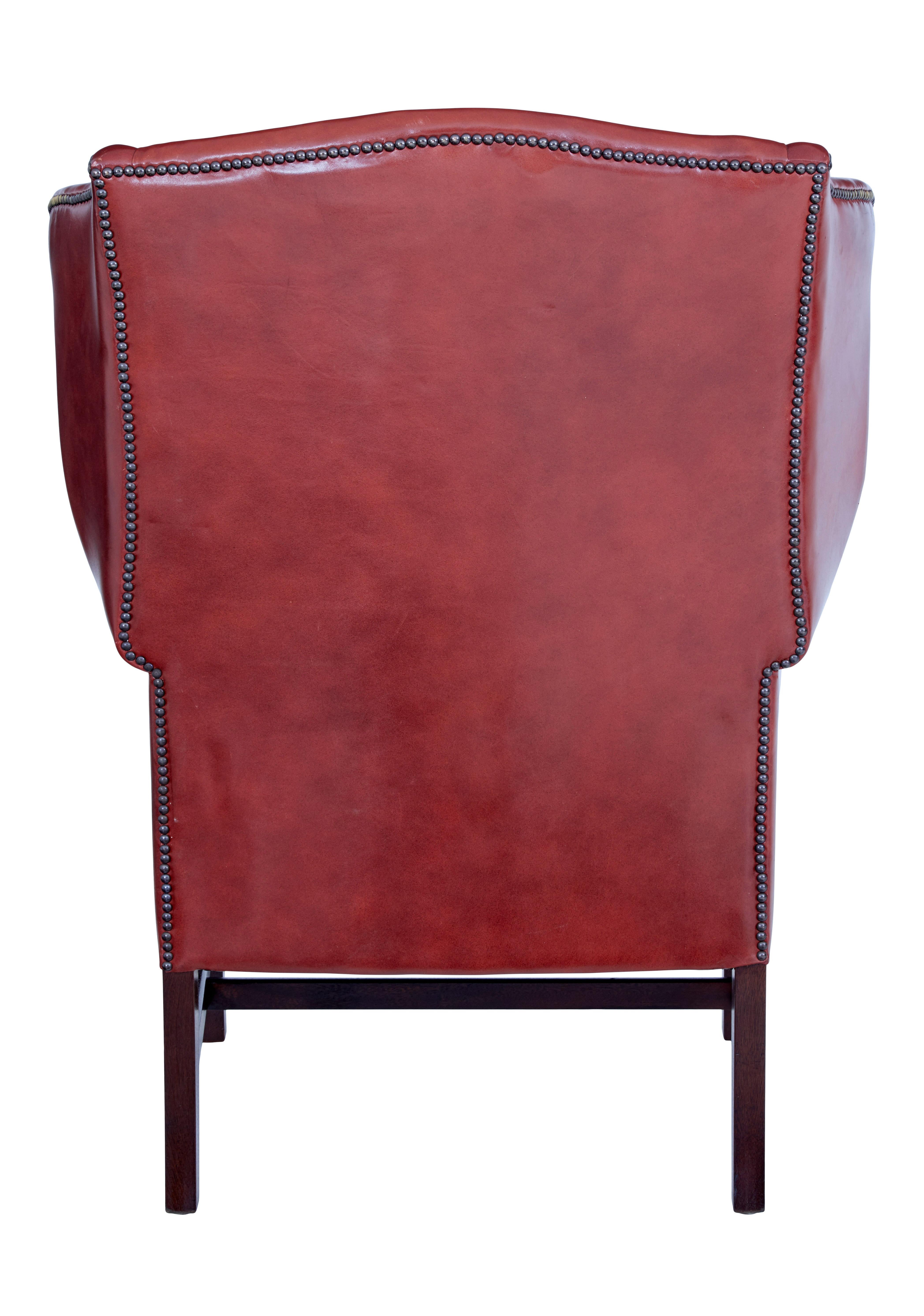 English Mid 20th century leather wingback armchair For Sale