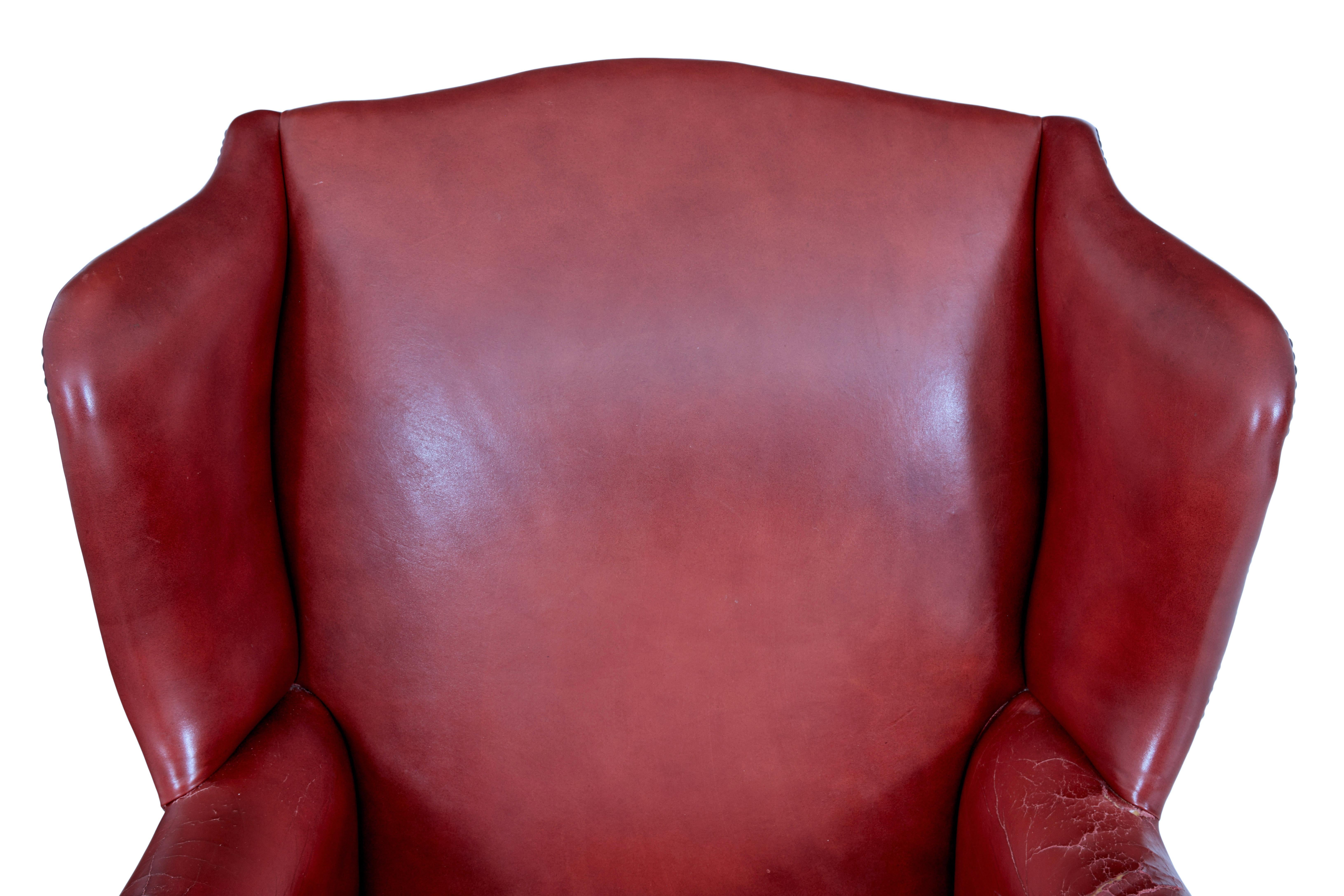 20th Century Mid 20th century leather wingback armchair For Sale