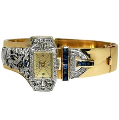 Mid-20th Century Longines Driving Watch in 14K Gold and Platinum with Gemstones