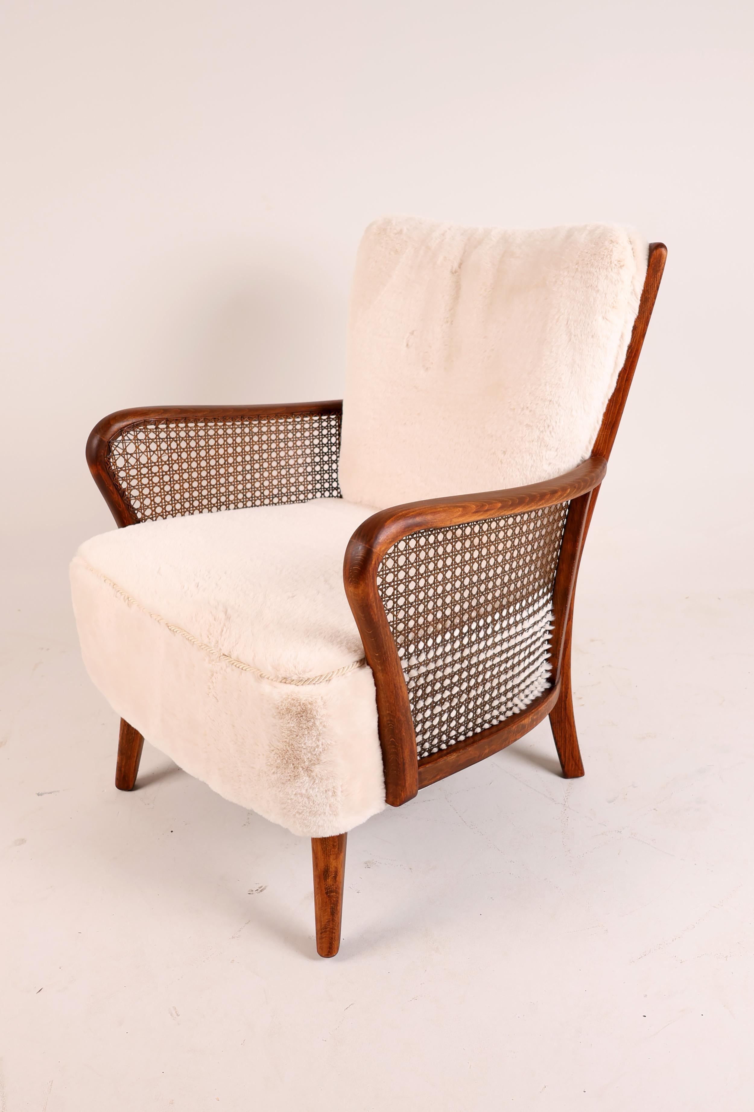 German Mid 20th Century Lounge Chair in Rattan For Sale