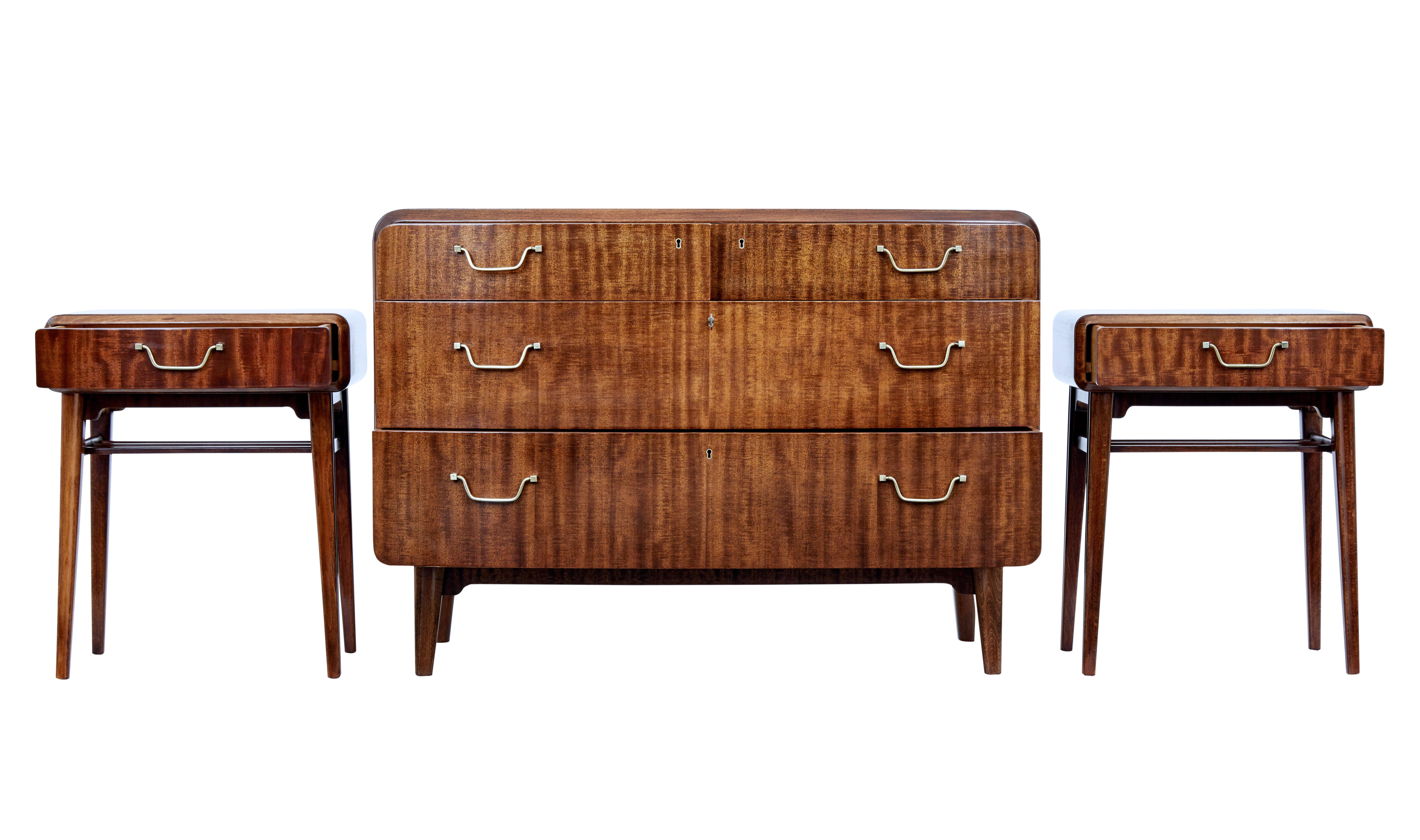 Mid-20th century mahogany 3-piece bedroom suite by SMF Bodafors, circa 1950.

Stunning set comprising of a chest of drawers and a pair of bedside tables, designed by well-known Swedish designer Axel Larsson (1898-1975) for Swedish company