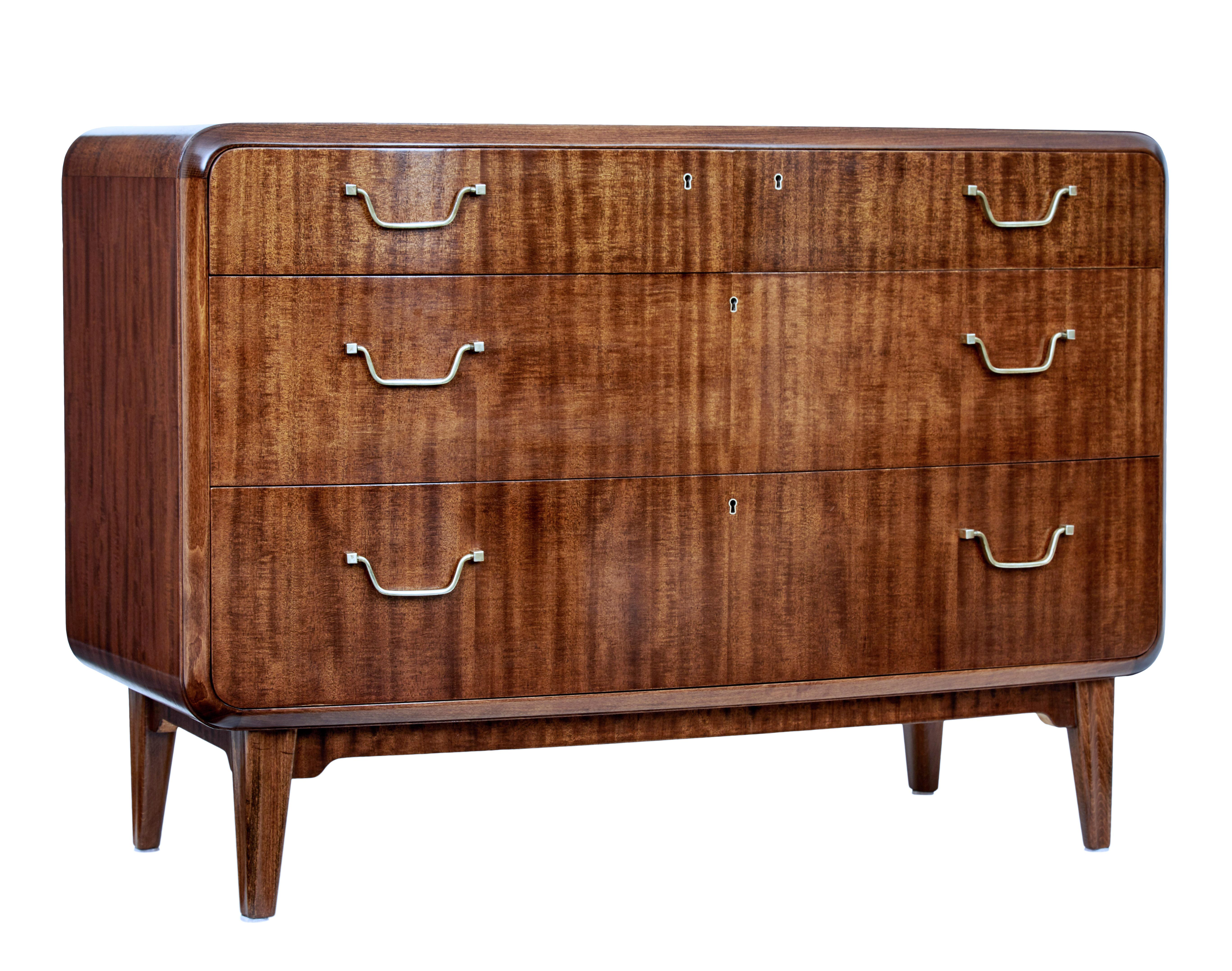 Mid-20th century mahogany 3-piece bedroom suite by SMF Bodafors, circa 1950.

Stunning set comprising of a chest of drawers and a pair of bedside tables, designed by well known Swedish designer Axel Larsson (1898-1975) for Swedish company