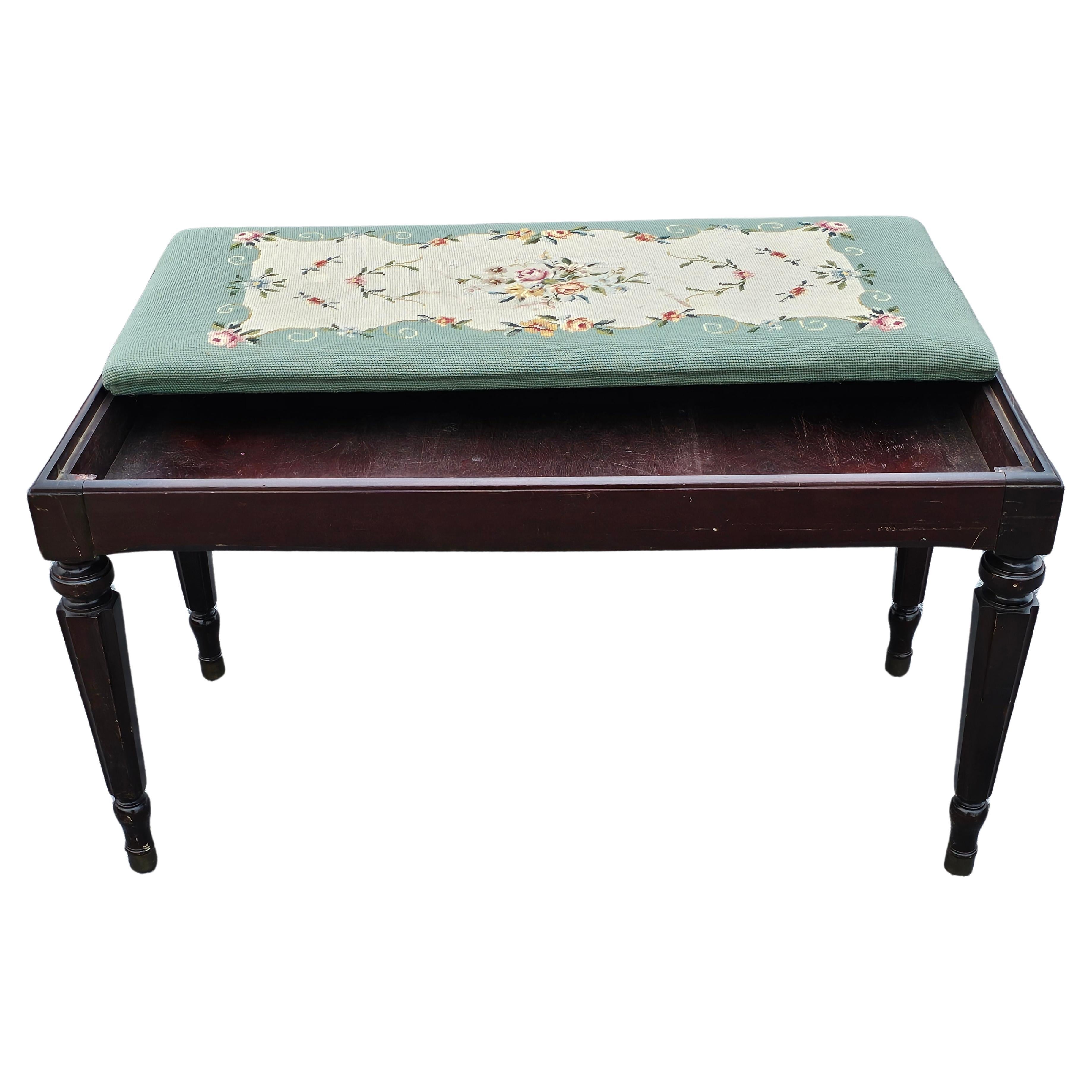Mid 20th Century Mahogany and Needlepoint Upholstered Bench with under seat Storage. 
Measures 34