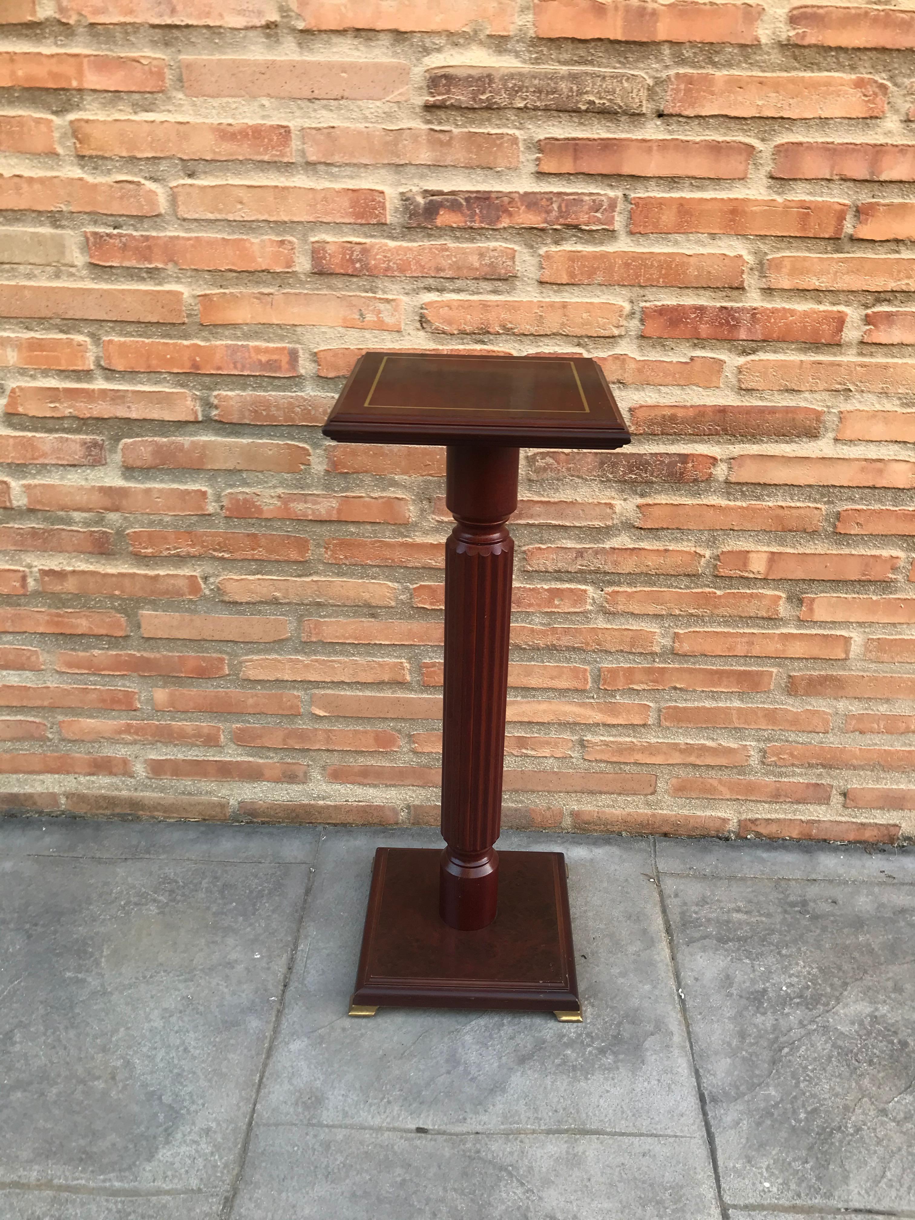 Mid-20th century mahogany wood square top pedestal table with marquetry inlay top.