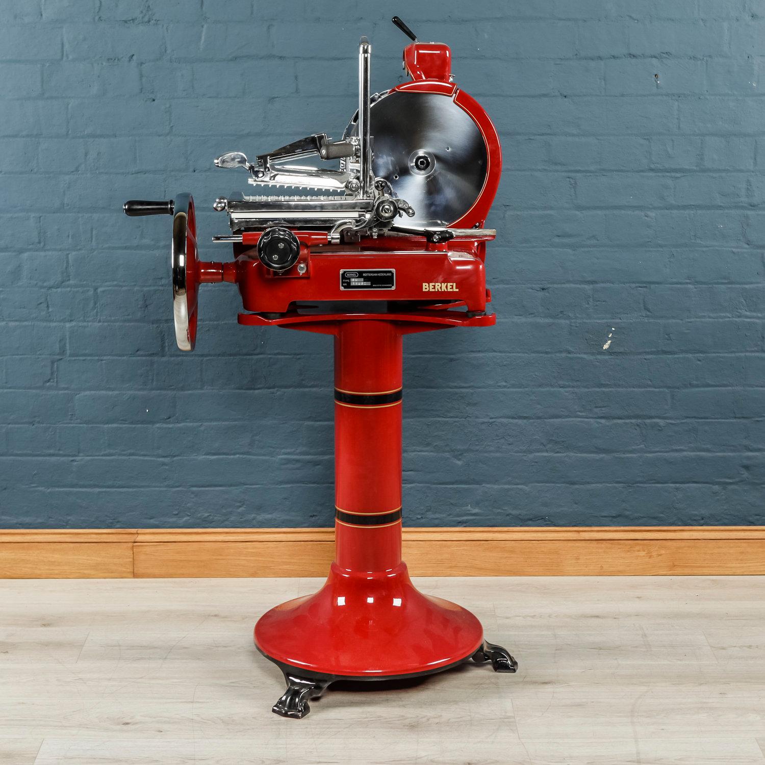 A rare meat slicer made by one of the most famous manufacturers: Berkel, Holland. This model is an H9 and comes in two parts, the base which can be removed from the main machine and placed on a counter. Perfect proportions for both domestic and
