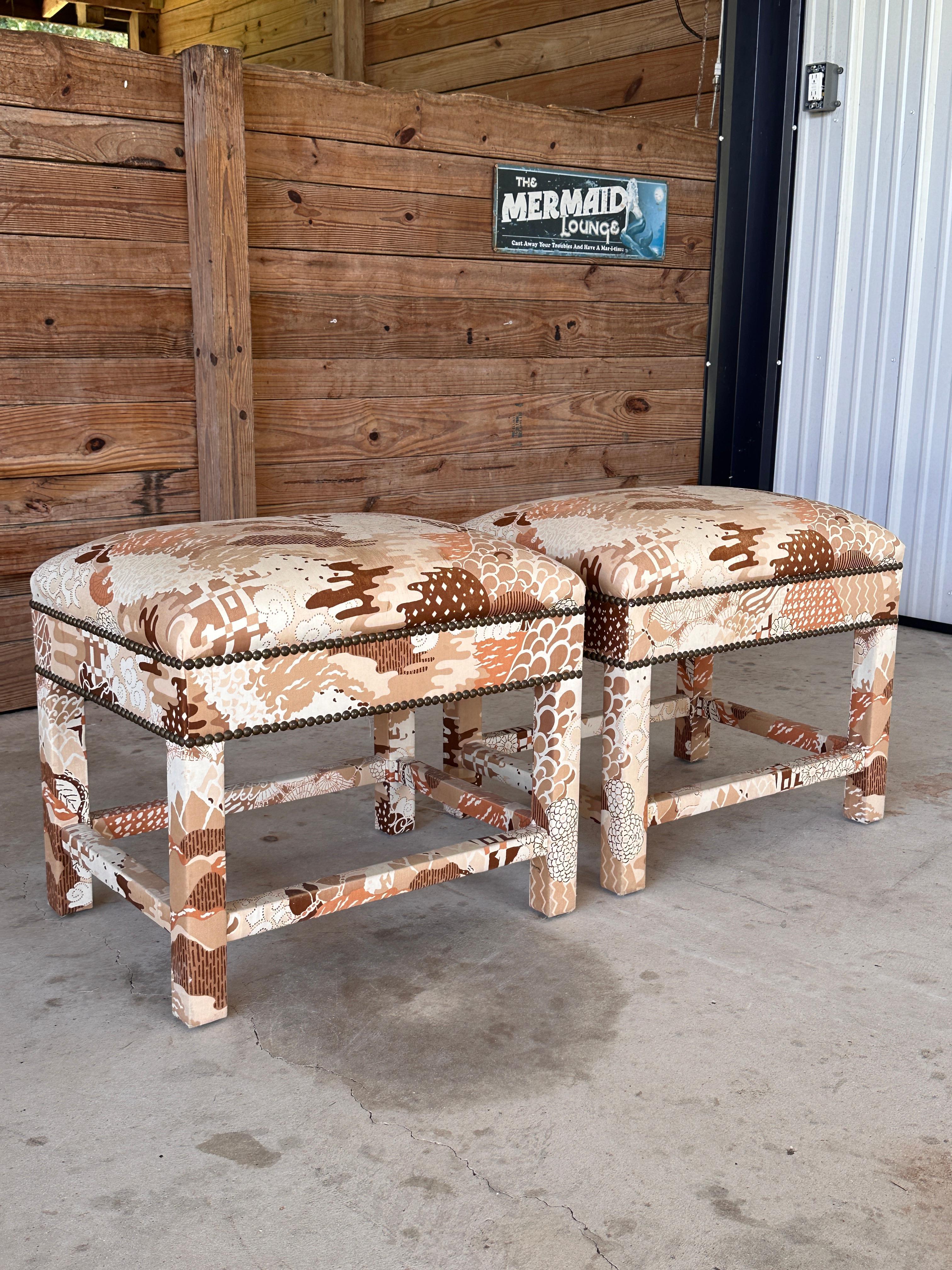 Pair of 1960s wood-framed benches in the style of or are Milo Baughman, featuring their original retro fabric with a captivating geometric pattern.
The upholstery, though in need of a refresh, showcases a playful yet sophisticated palette of earthy