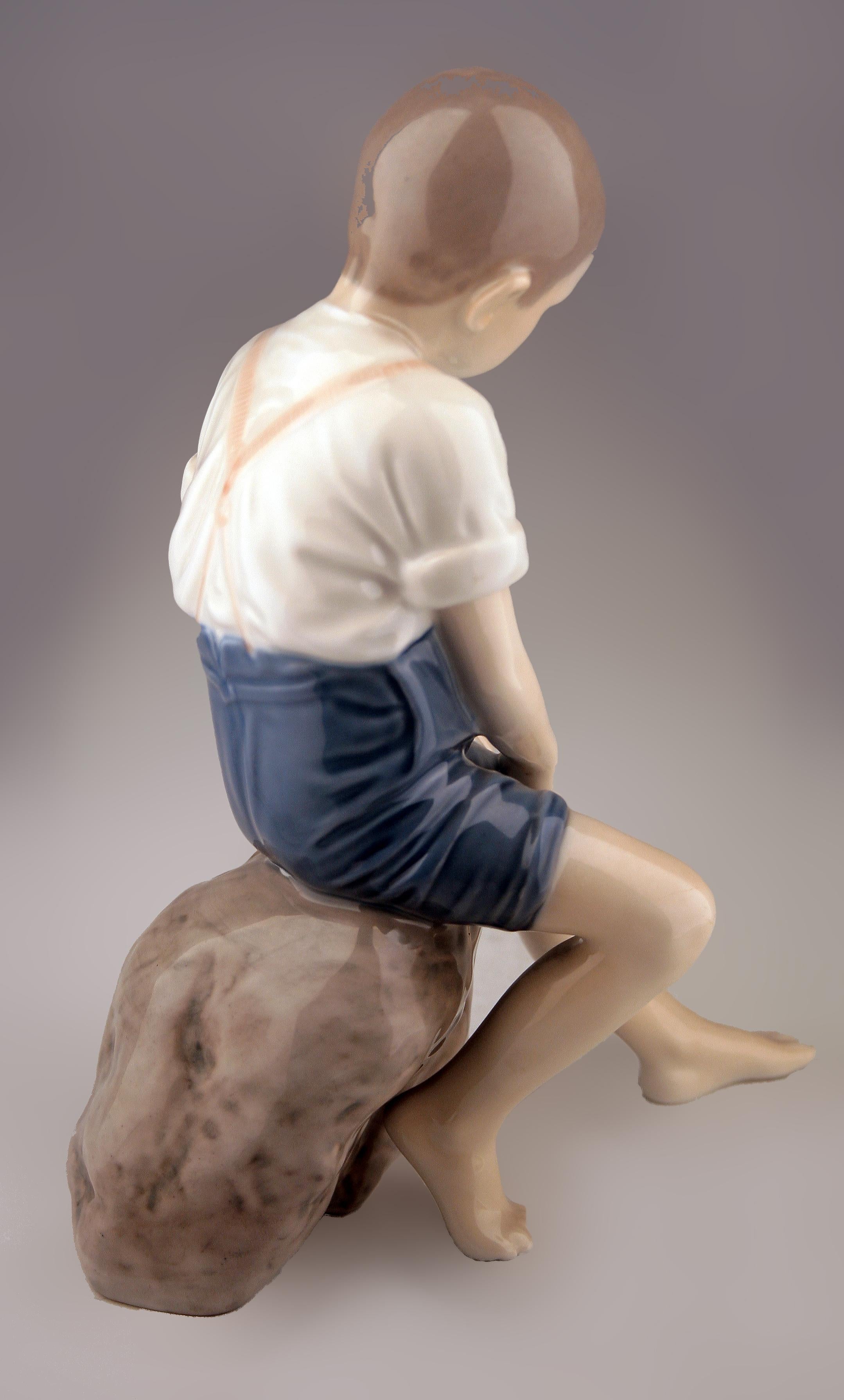 Polished Mid-20th Century Modern Danish Porcelain Sculpture of Boy by Bing & Grøndahl For Sale