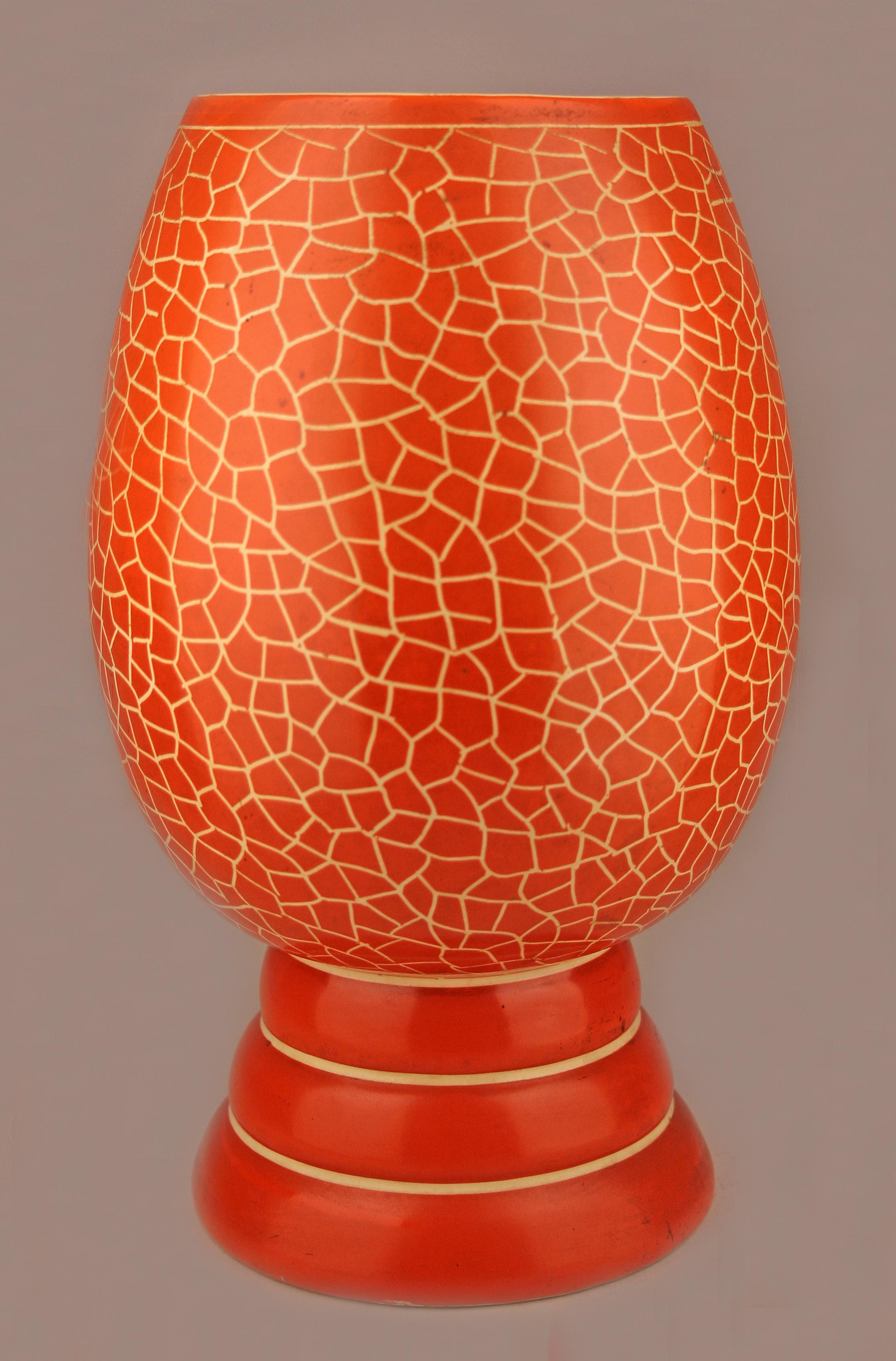Mid-20th century Modern Deruta-like italian orange glazed ceramic painted vase

By: Deruta (in the style of)
Material: ceramic, pottery, paint
Technique: molded, pressed, painted, glazed
Date: mid-20th century, circa 1950
Style: Mid-Century Modern,