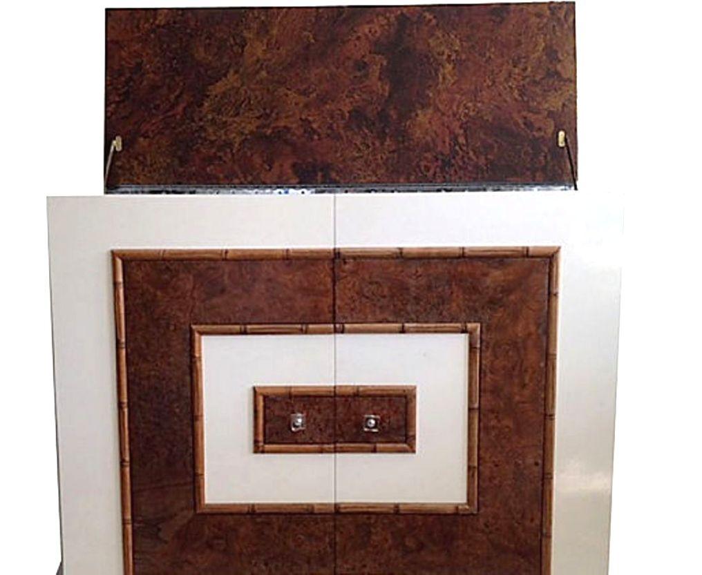 Mid-Century Modern faux bamboo laminated veneer burl wood and Lucite flip-top, two-door dry bar & cabinet in the style of Milo Baughman. Includes two new custom made Lucite 1/2