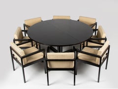 Mid-20th Century Modern Round Dining Table, extendable with 8 Matching Chairs