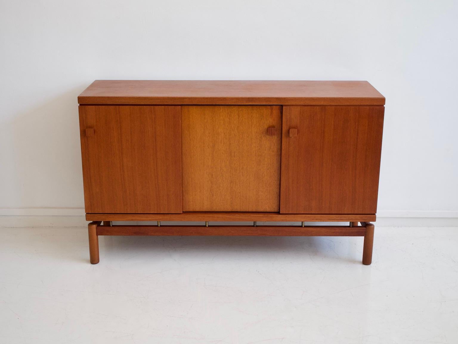 Italian Mid-20th Century Modern Teak Sideboard with Brass Details For Sale