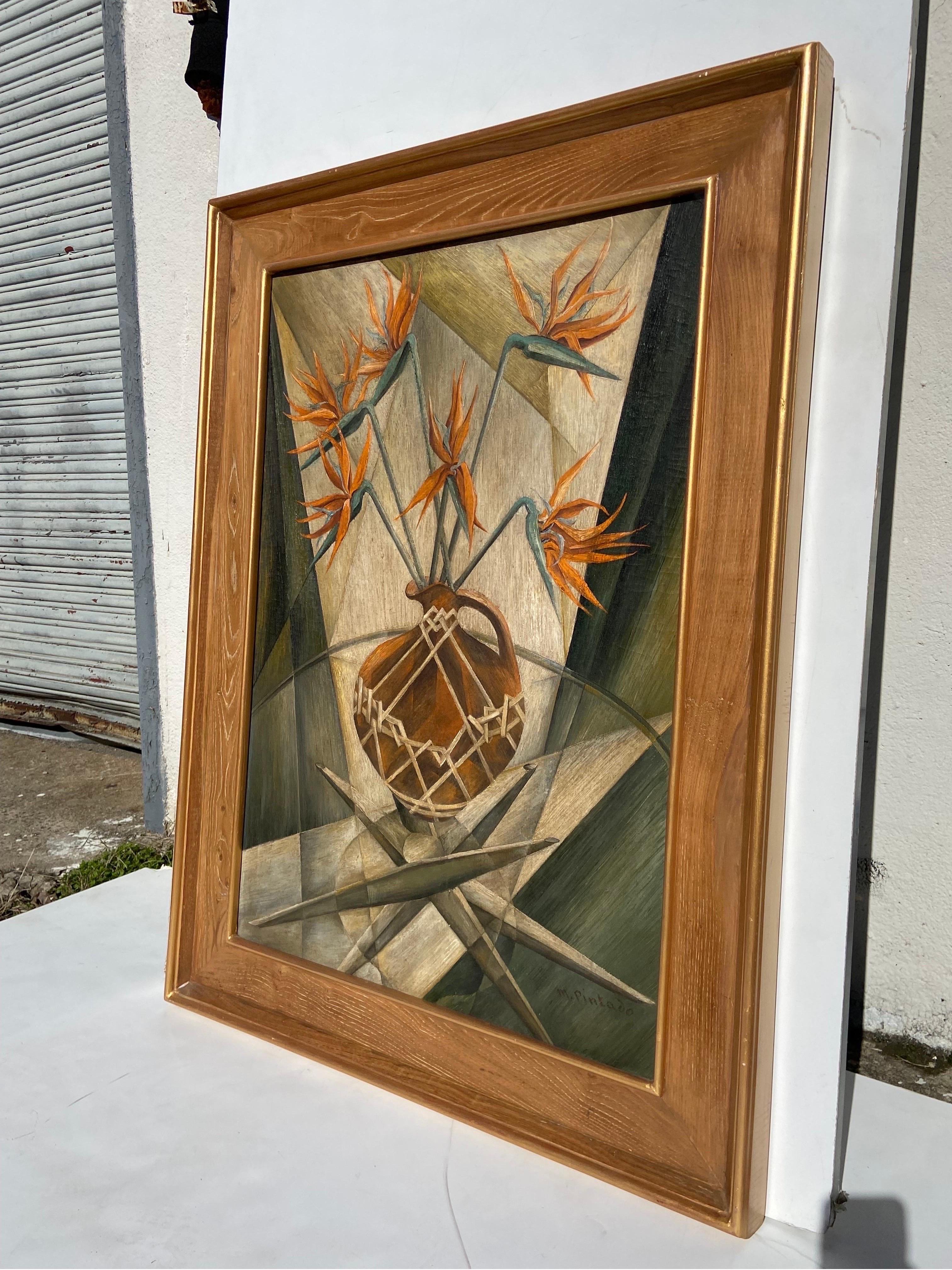 An early to mid 20th century era oil on canvas painting signed M. Pintado in the lower right corner as well as on verso along with New York. This work depicts beautiful Bird of Paradise flower stems arranged in a Modernist style vase set atop a Mid