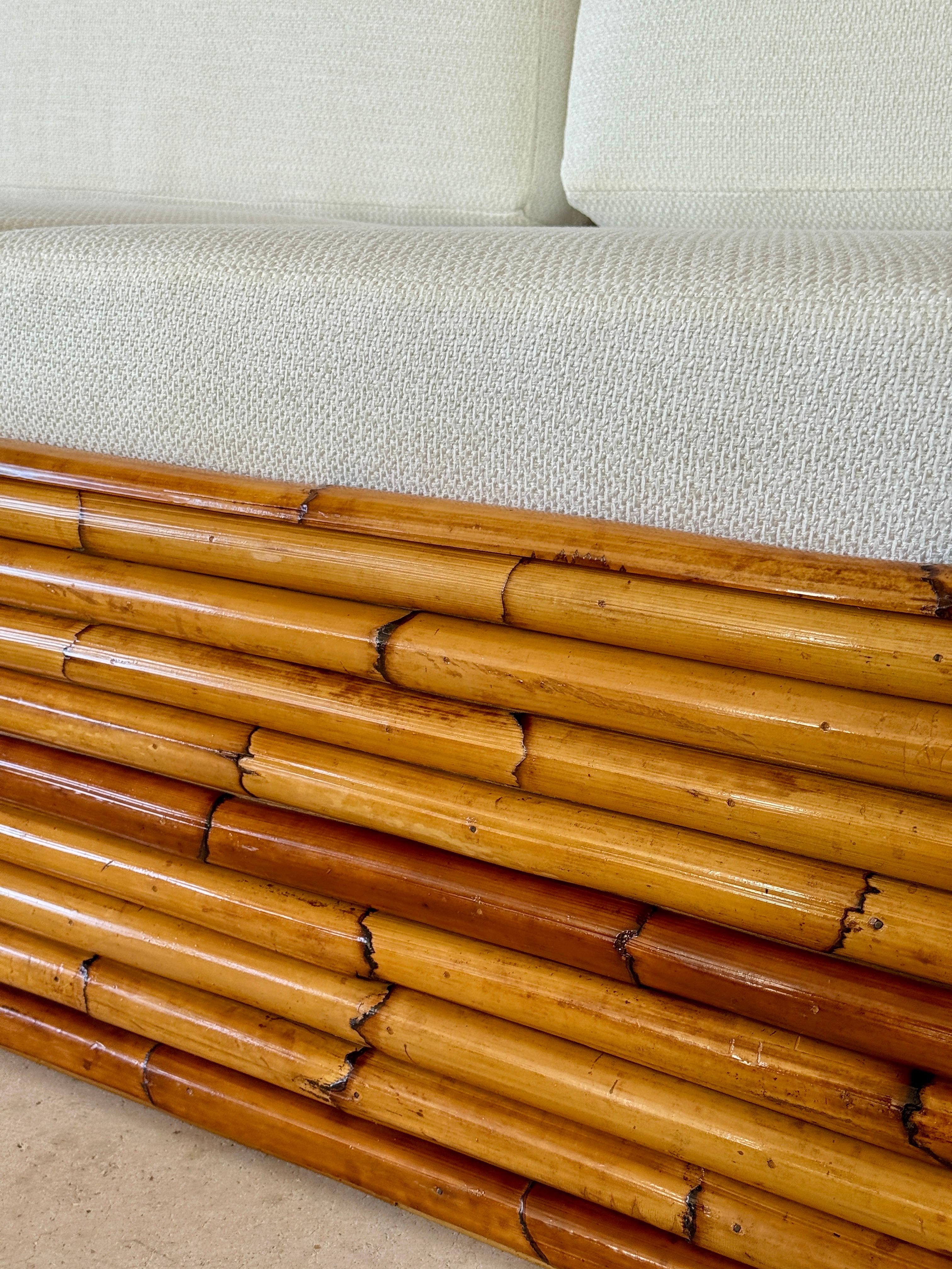 Hand-Crafted Mid-20th Century Monumental Restored Stacked Rattan Sofa With Custom Upholstery For Sale