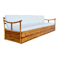 Mid-20th Century Monumental Restored Stacked Rattan Sofa With Custom Upholstery