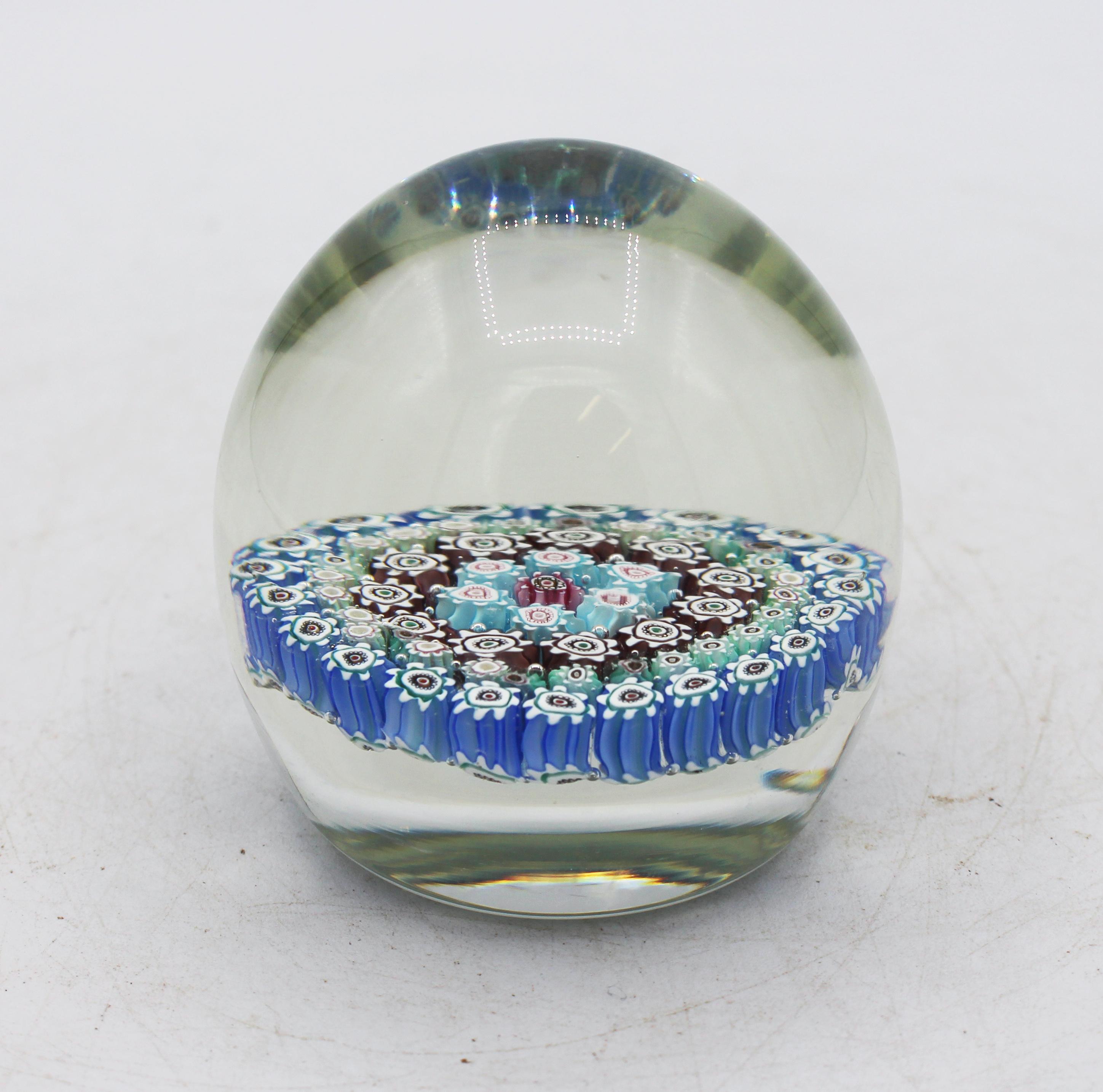 Mid-20th century Murano millefiori paperweight. Finely done with white, blues, green, mauve & pink.
2.75
