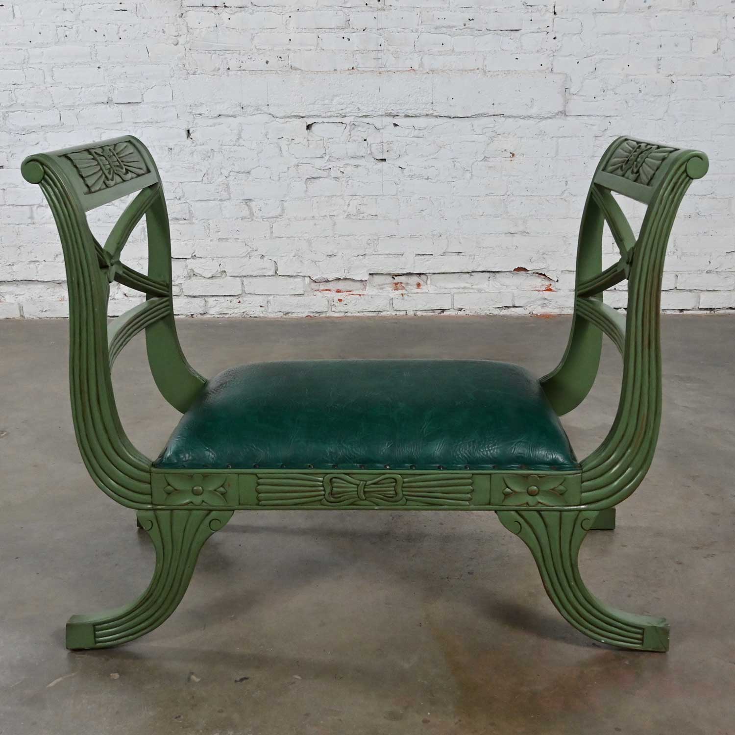 Fabulous vintage Neoclassic style hunter green textured faux leather short bench or vanity stool. Beautiful condition, keeping in mind that this is vintage and not new so will have signs of use and wear. There are no outstanding flaws that we have
