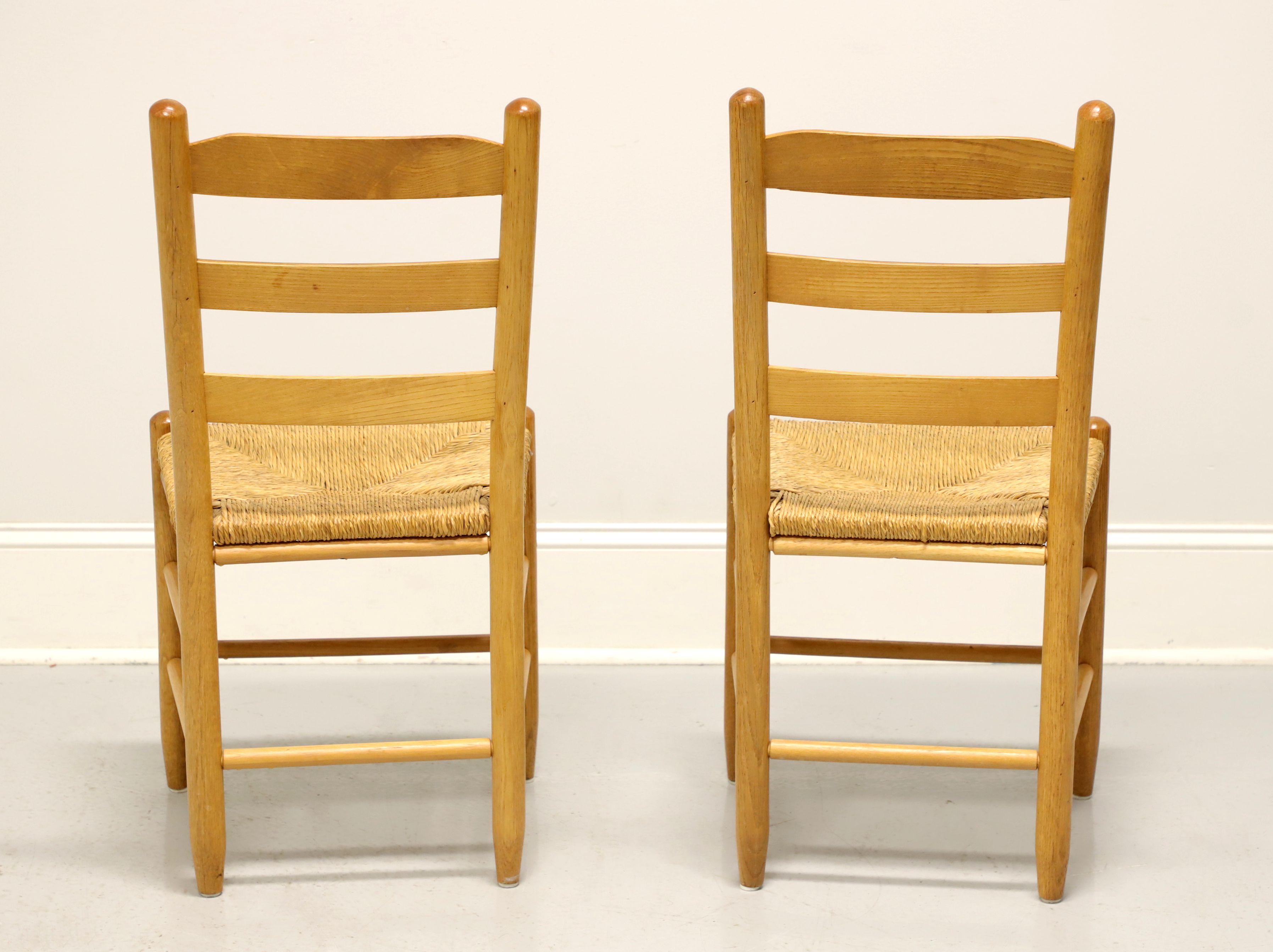 Mid 20th Century Oak Ladder Back Side Chairs with Rush Seats - Pair A In Good Condition In Charlotte, NC