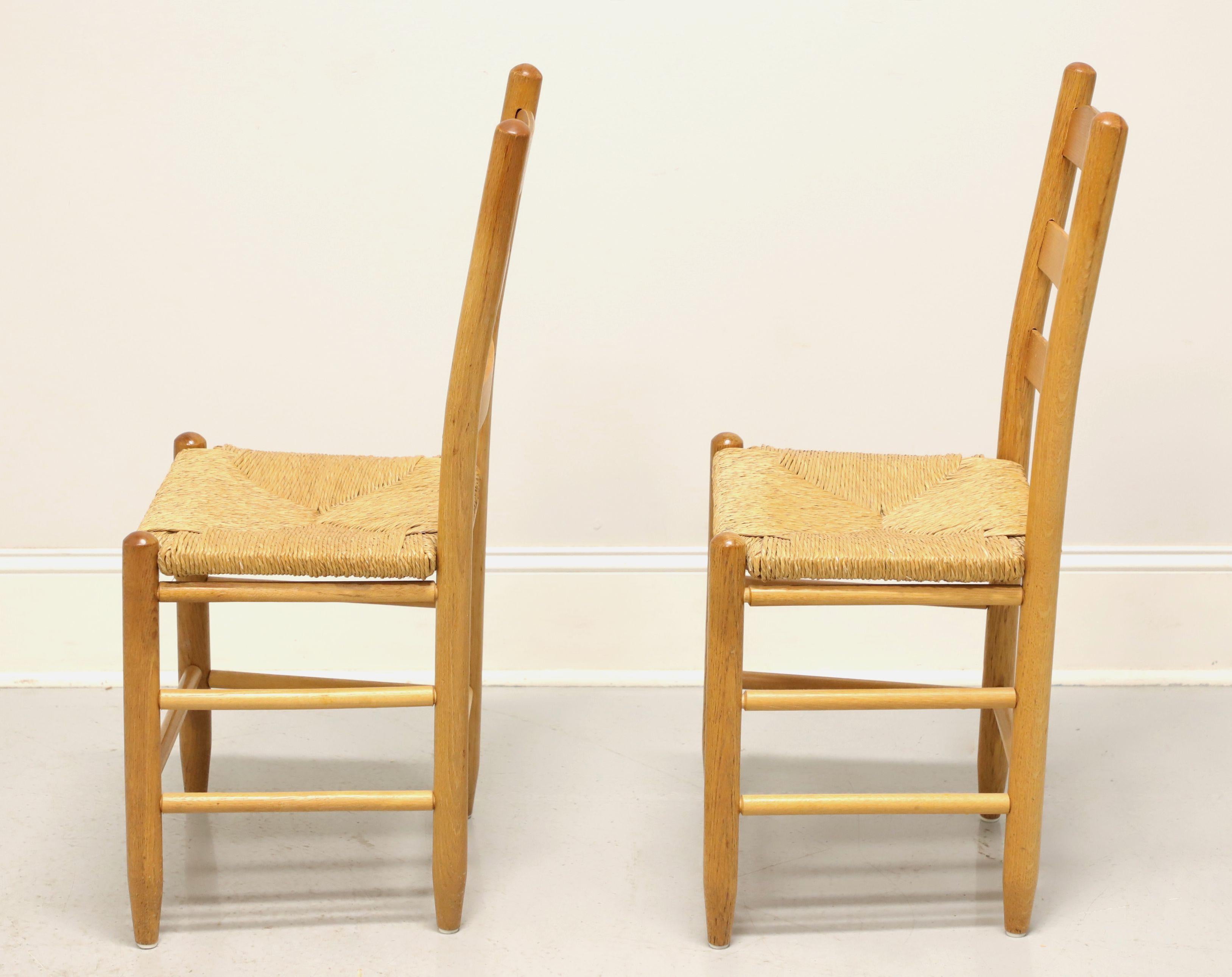 Mid 20th Century Oak Ladder Back Side Chairs with Rush Seats - Pair B In Good Condition For Sale In Charlotte, NC