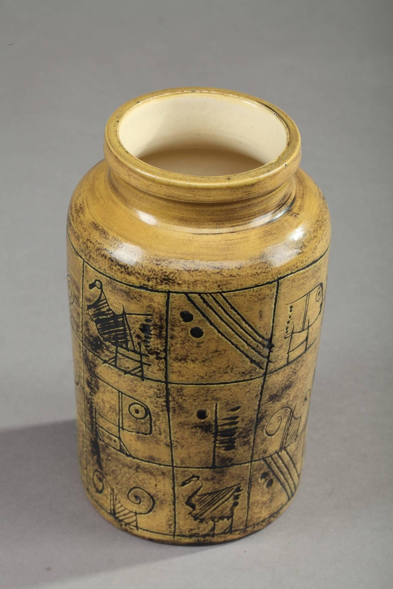 Cylindrical ceramic vase with Primitive style Sgraffito decoration composed of animals and geometrical motives in ochre glaze by noted artist Jacques Blin (French, 1920-1995). Incised signature underside: J. Blin,

circa 1950
Dimensions: W 3.9